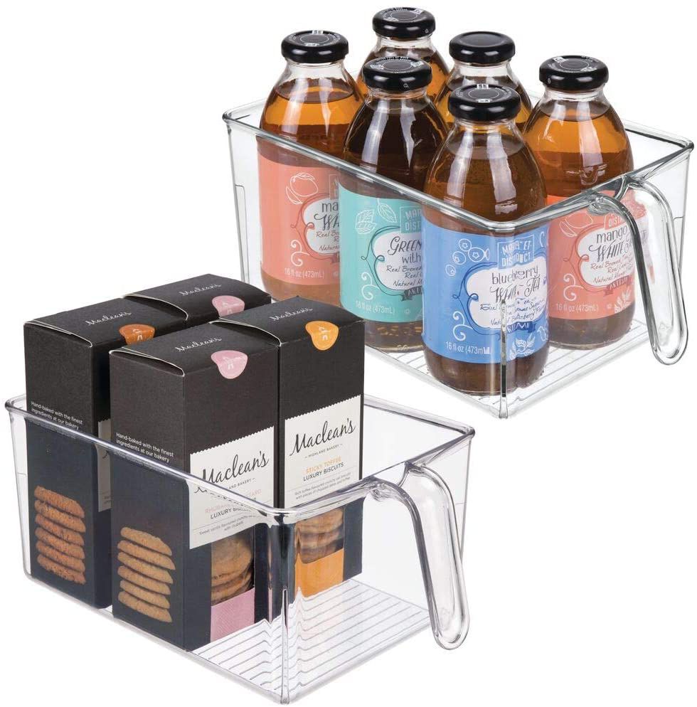 Two clear mDesign Pantry Organizer filled with bottles and snack boxes