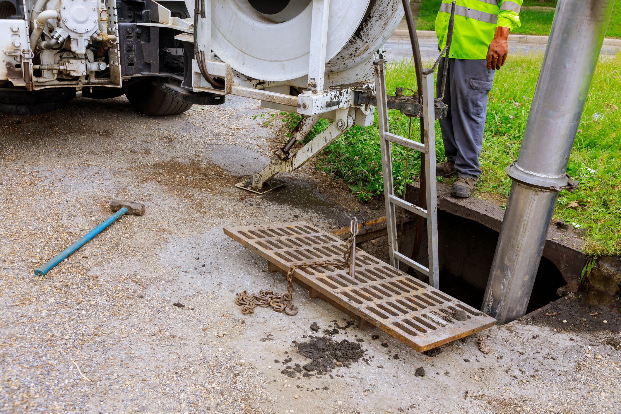 Sewage industrial cleaning truck clean blockage in a sewer line machine from the inside.