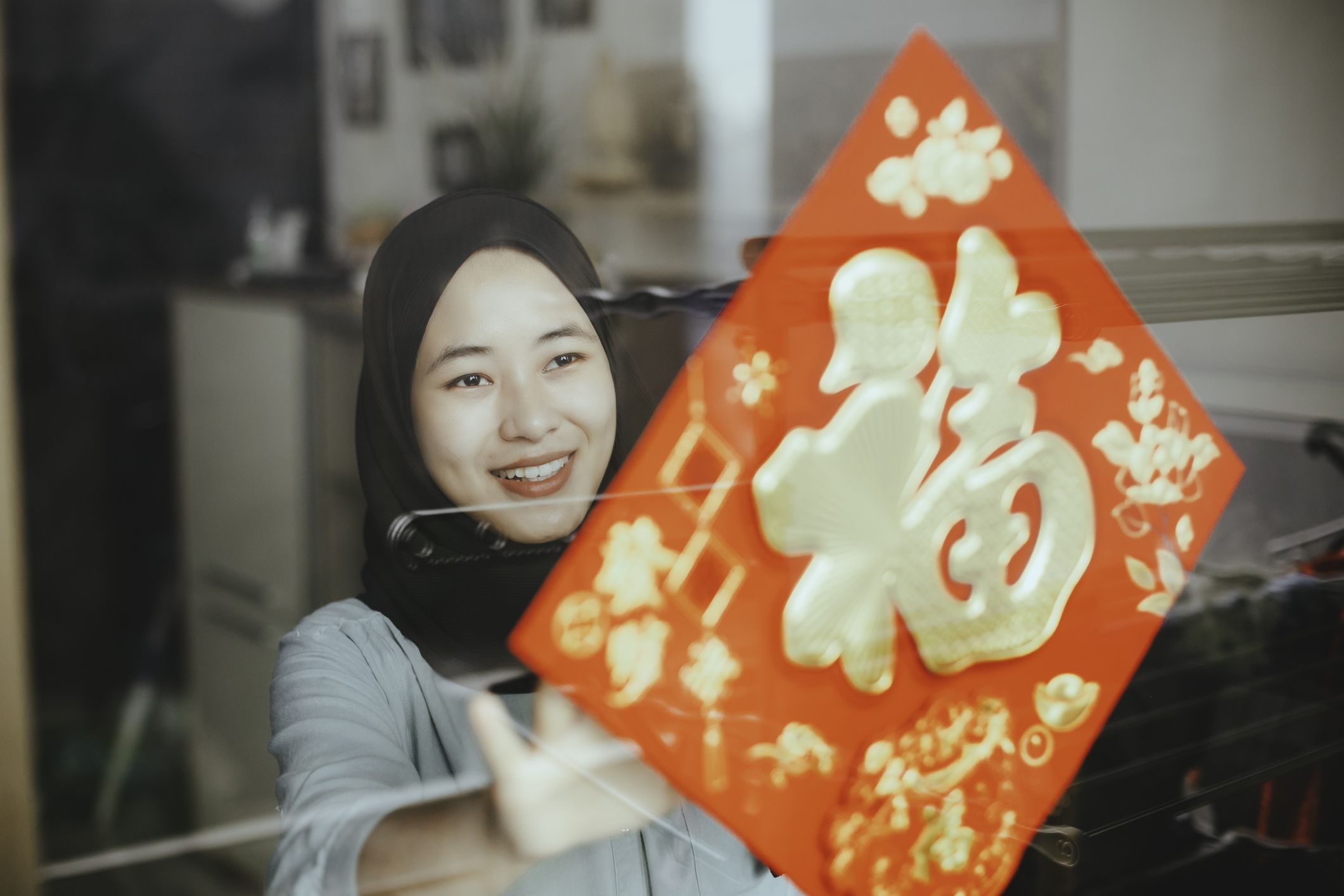 a chinese muslim decor her house for imlek celebration