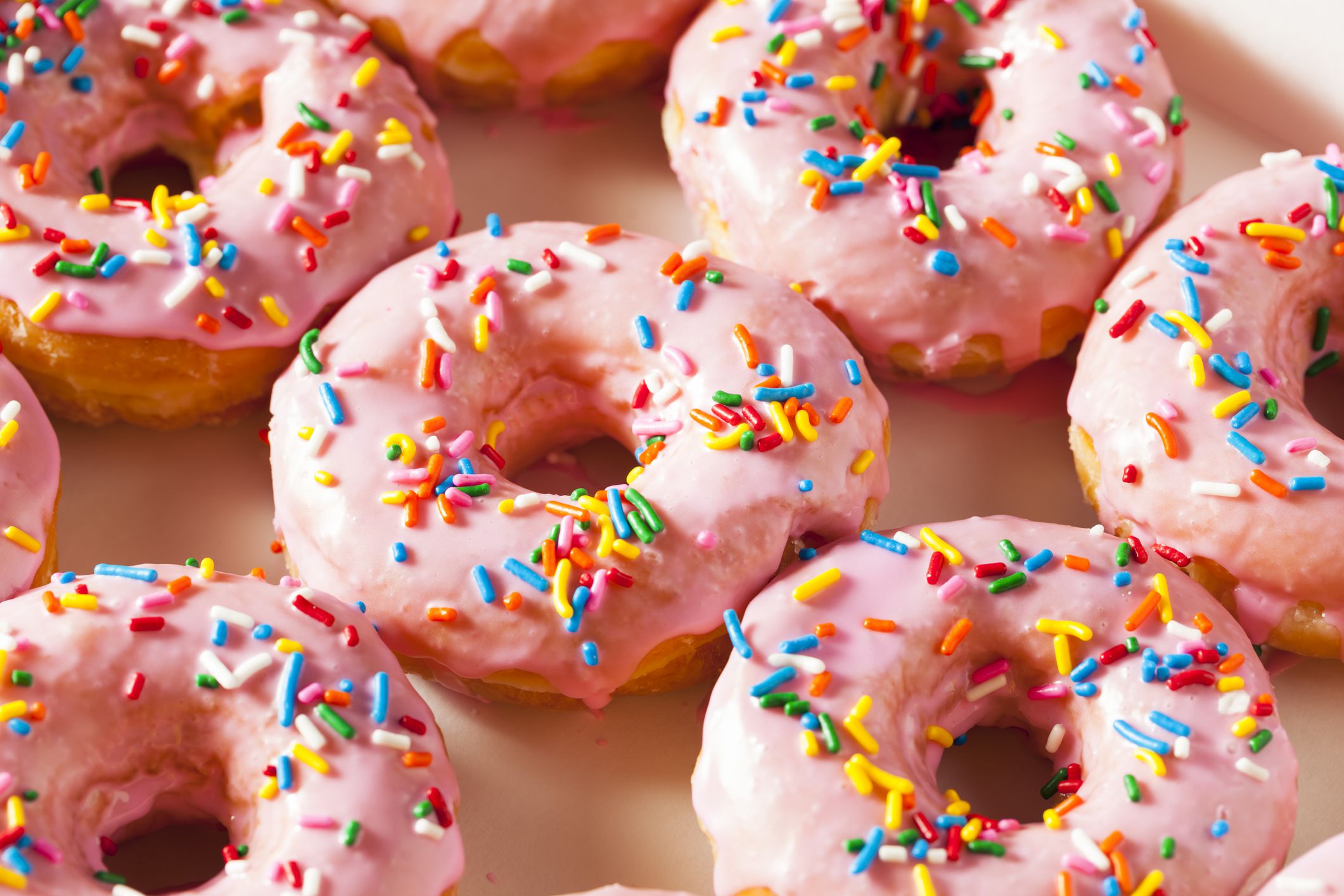 Homemade Sweet Donuts with Pink Frosting and Sprinkles