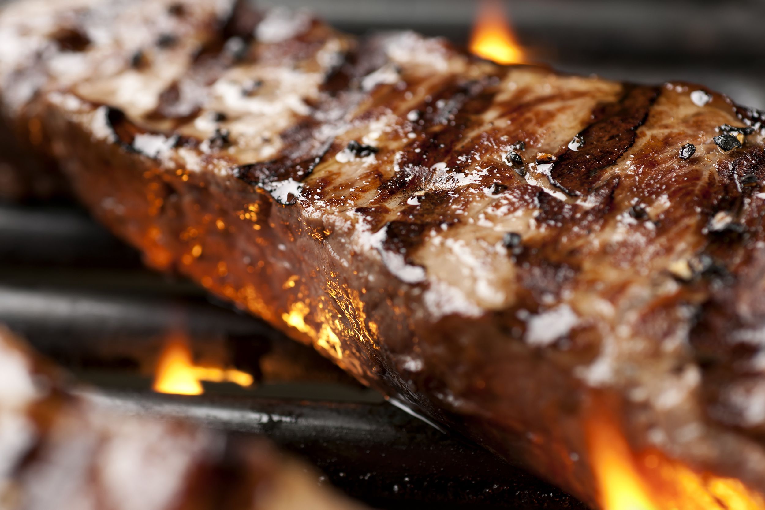 NY strip steak on grill