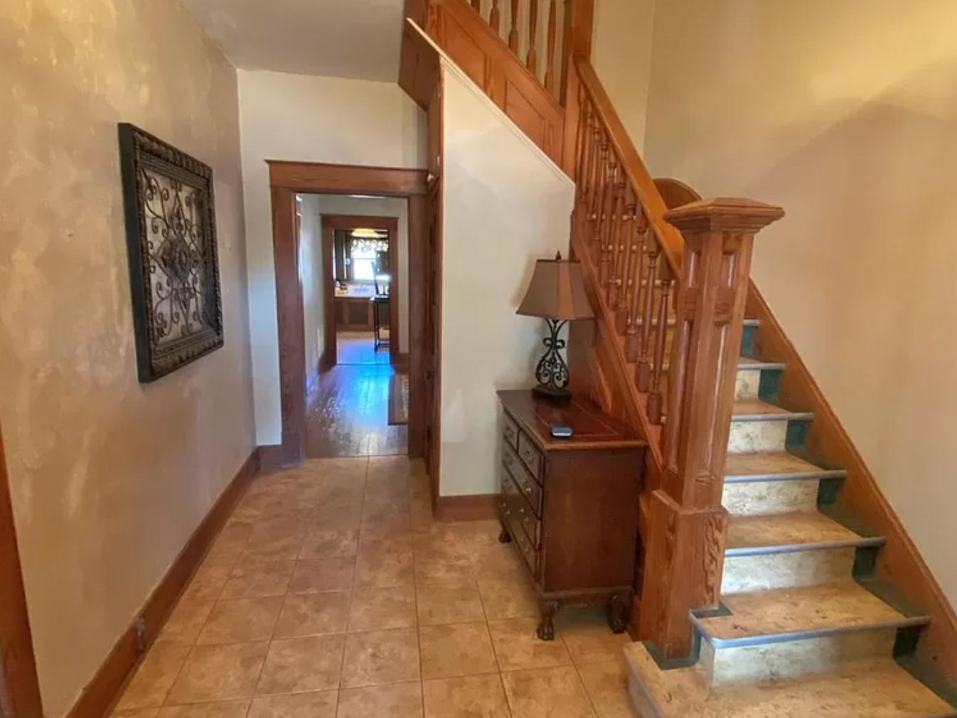 416 S Park St, Meade, KS 67864 Hallway with Stairs, Dining Room and Kitchen in the Background