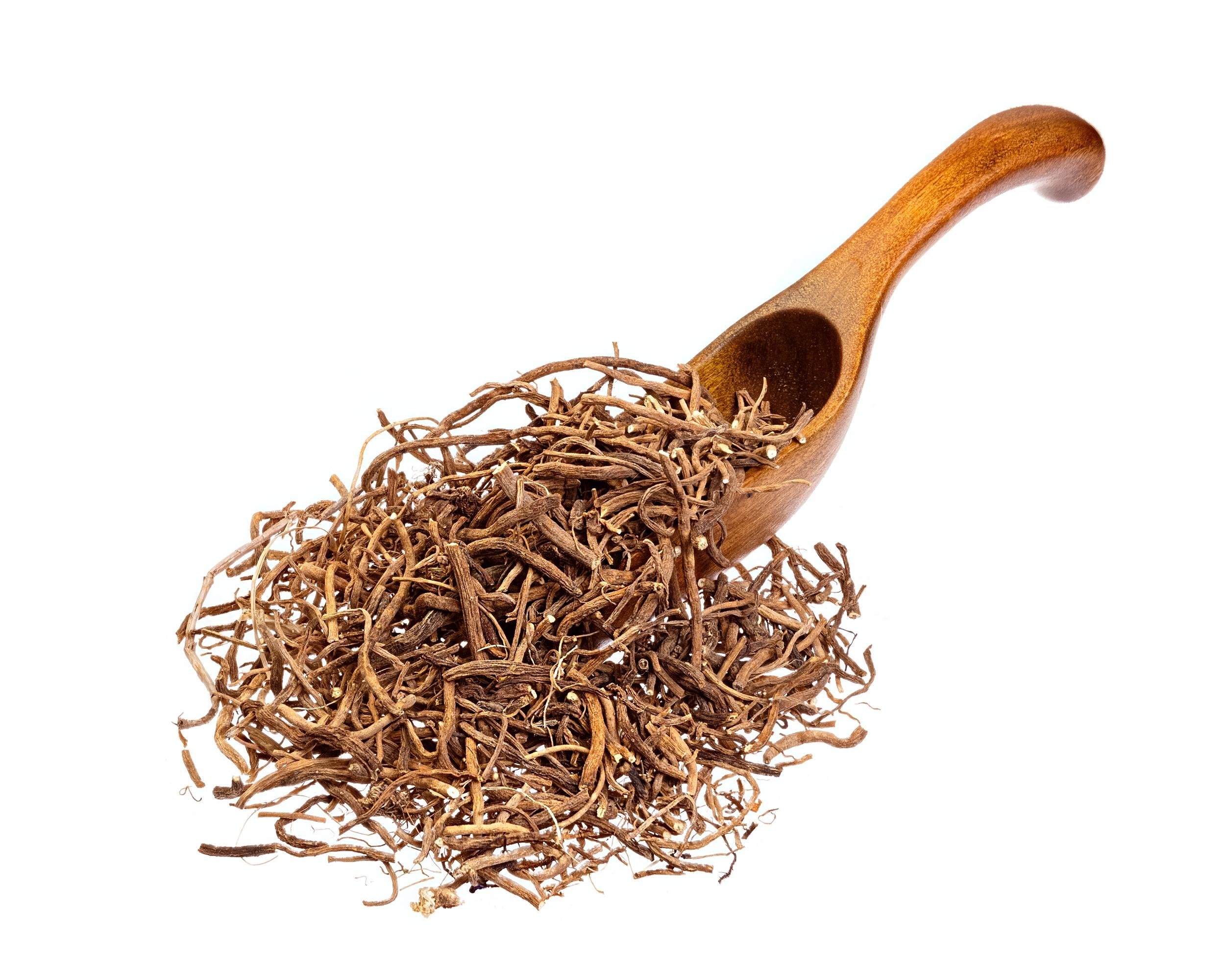 valerian root on the wooden spoon