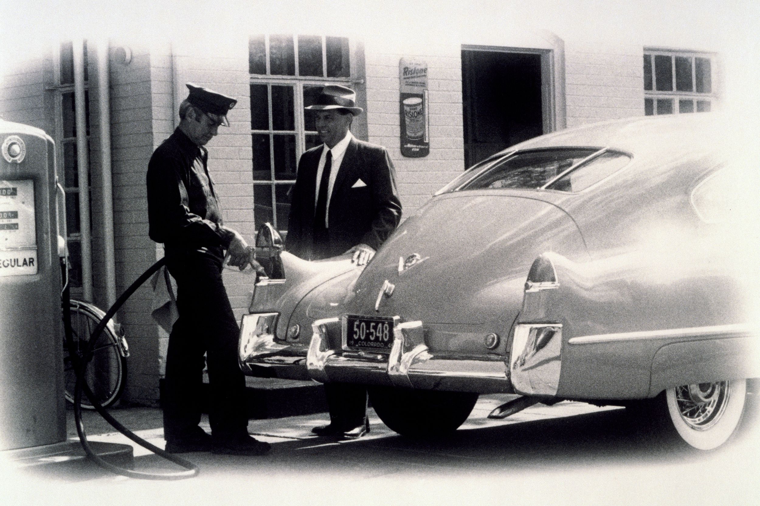Old-fashioned gas station attendant