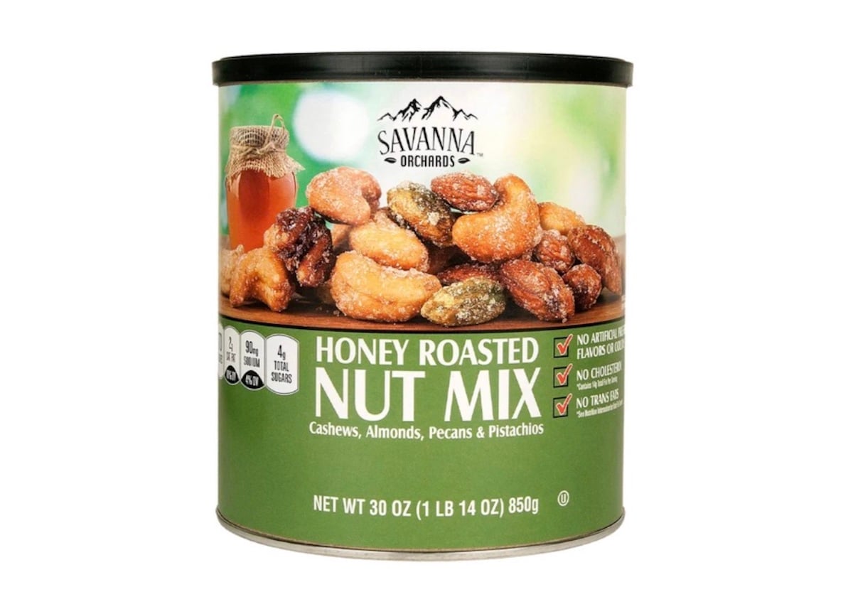 A 30-ounce canister of Savanna Orchards Honey Roasted Nut Mix, featuring cashews, almonds, peanuts, and pistachios. The green label highlights gluten-free ingredients and no artificial flavors—perfect for those seeking Costco deals for seniors.