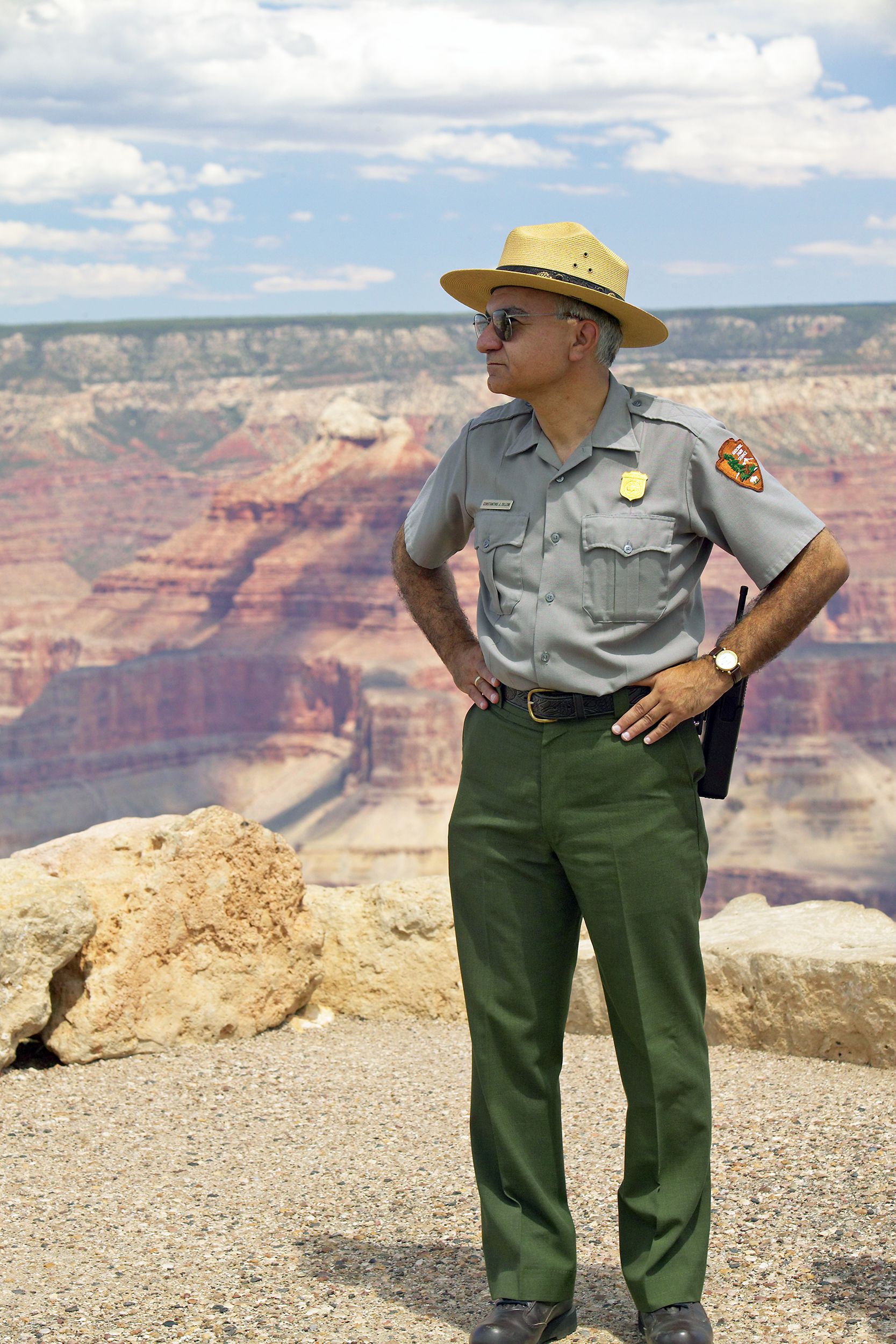 Senior man park ranger standing at the South Rim of Grand Canyon National Park