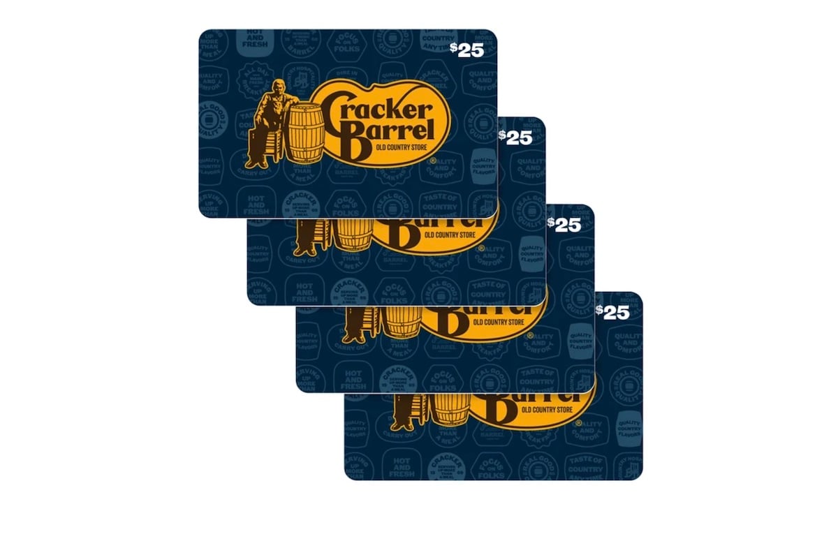 Four Cracker Barrel gift cards, each valued at $25, are stacked in a fanned arrangement. The navy blue cards with a yellow logo and illustration evoke the charm of Costco deals for seniors—perfect for thoughtful gifting.