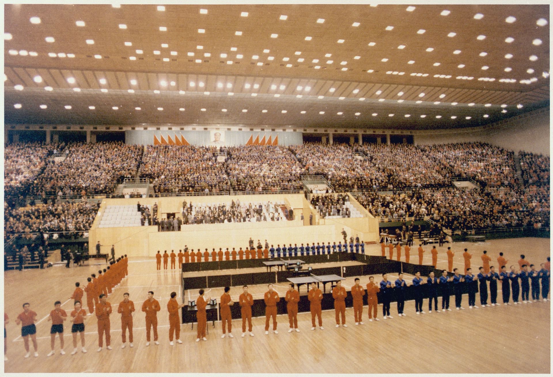 Nixon attending a ping-pong exhibition in Beijing.
