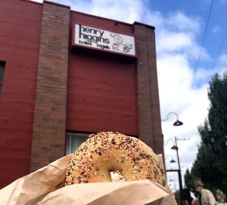 Henry Higgins Boiled Bagels- bagel in front of store front