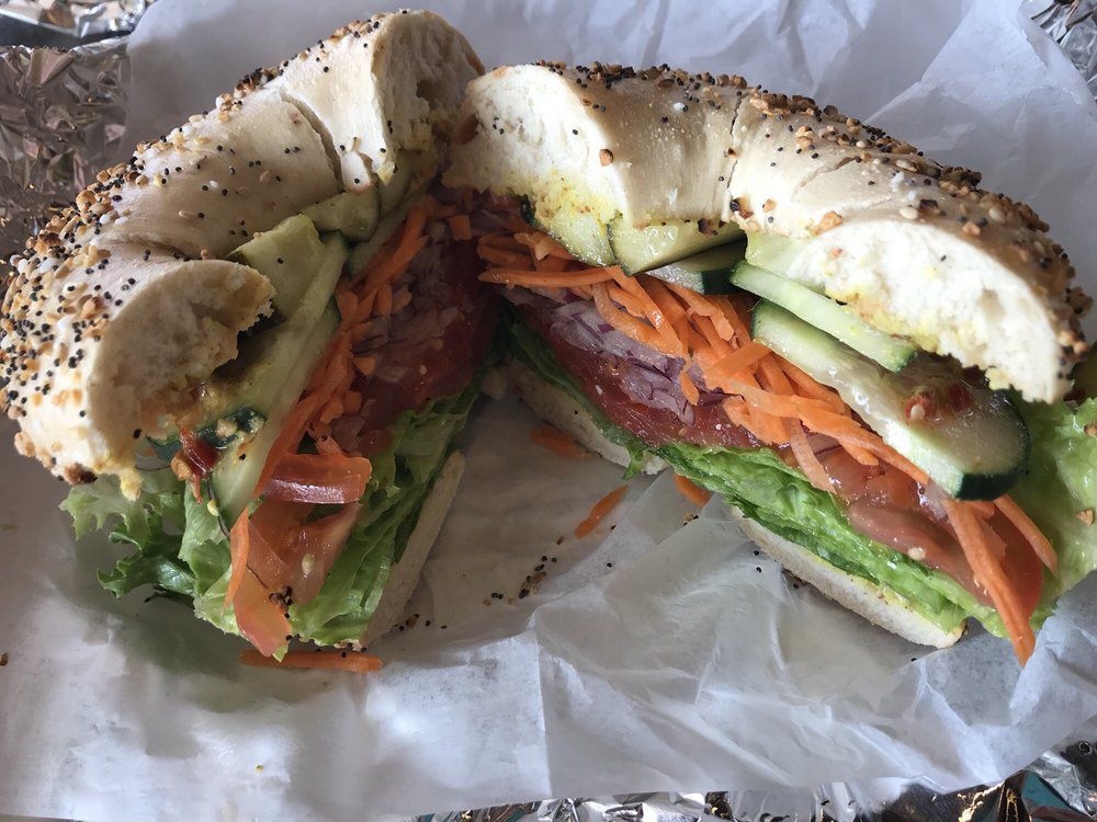 Royalicious Bagel Bakery veggie bagel cut in half