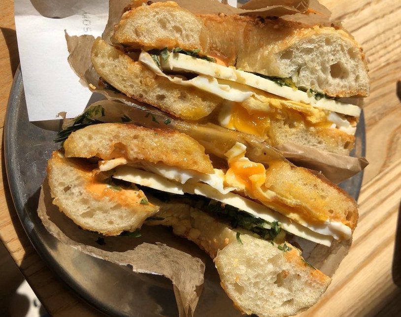 Bagelsaurus Eggspanola bagel cut in half