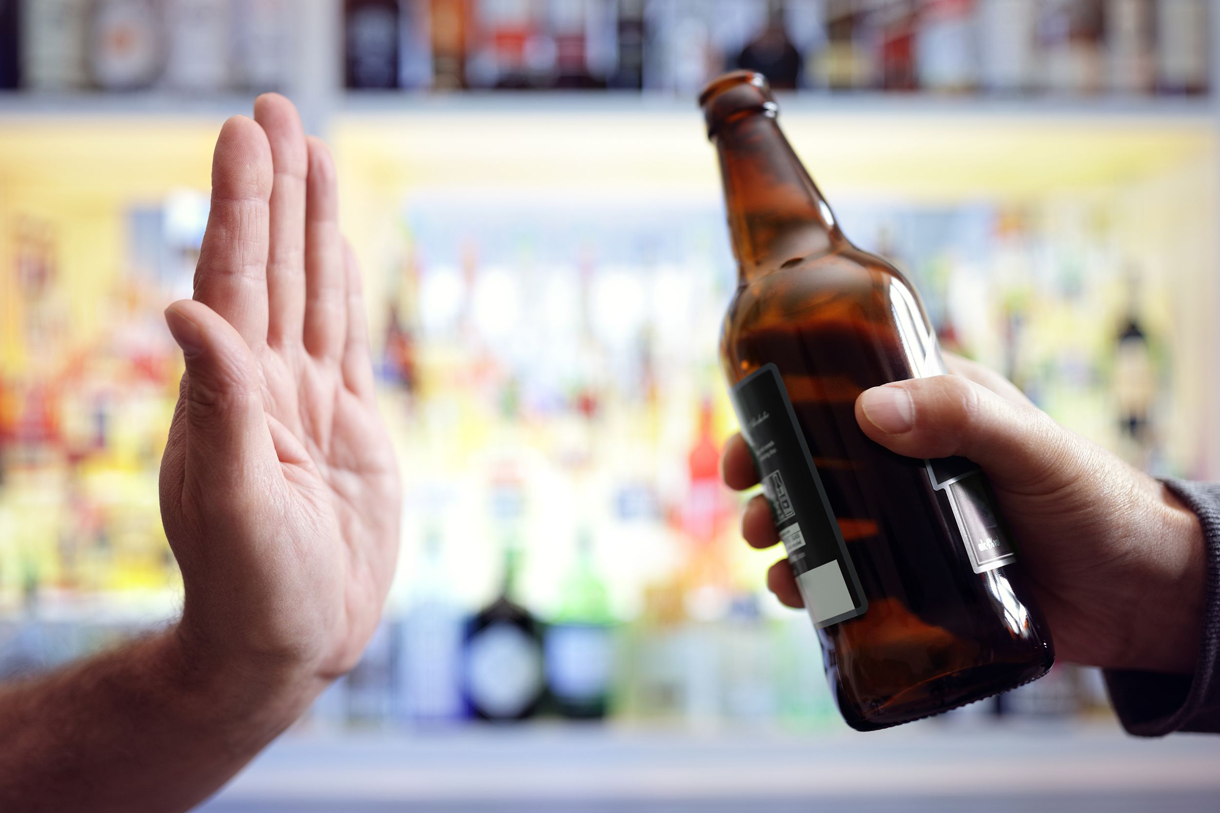 hand rejecting alcoholic beer beverage