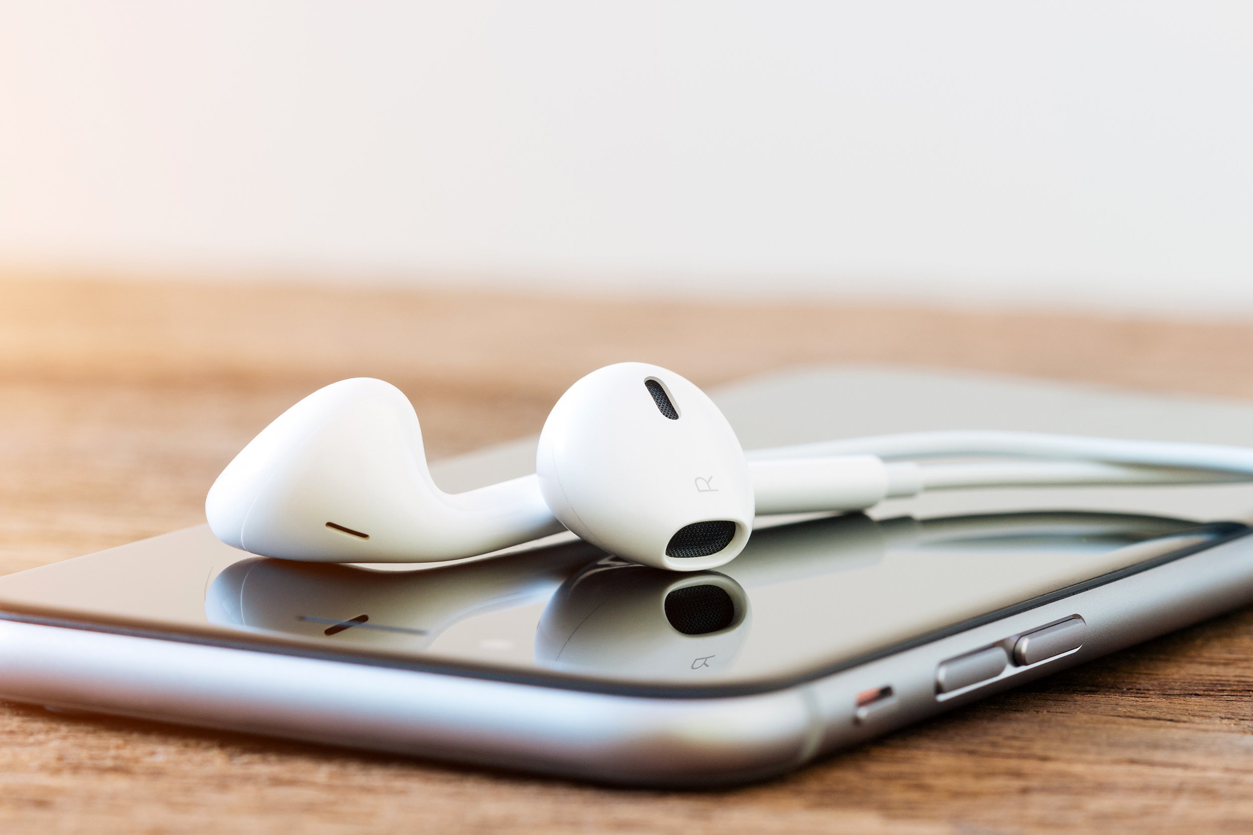 Earbuds on an iPhone