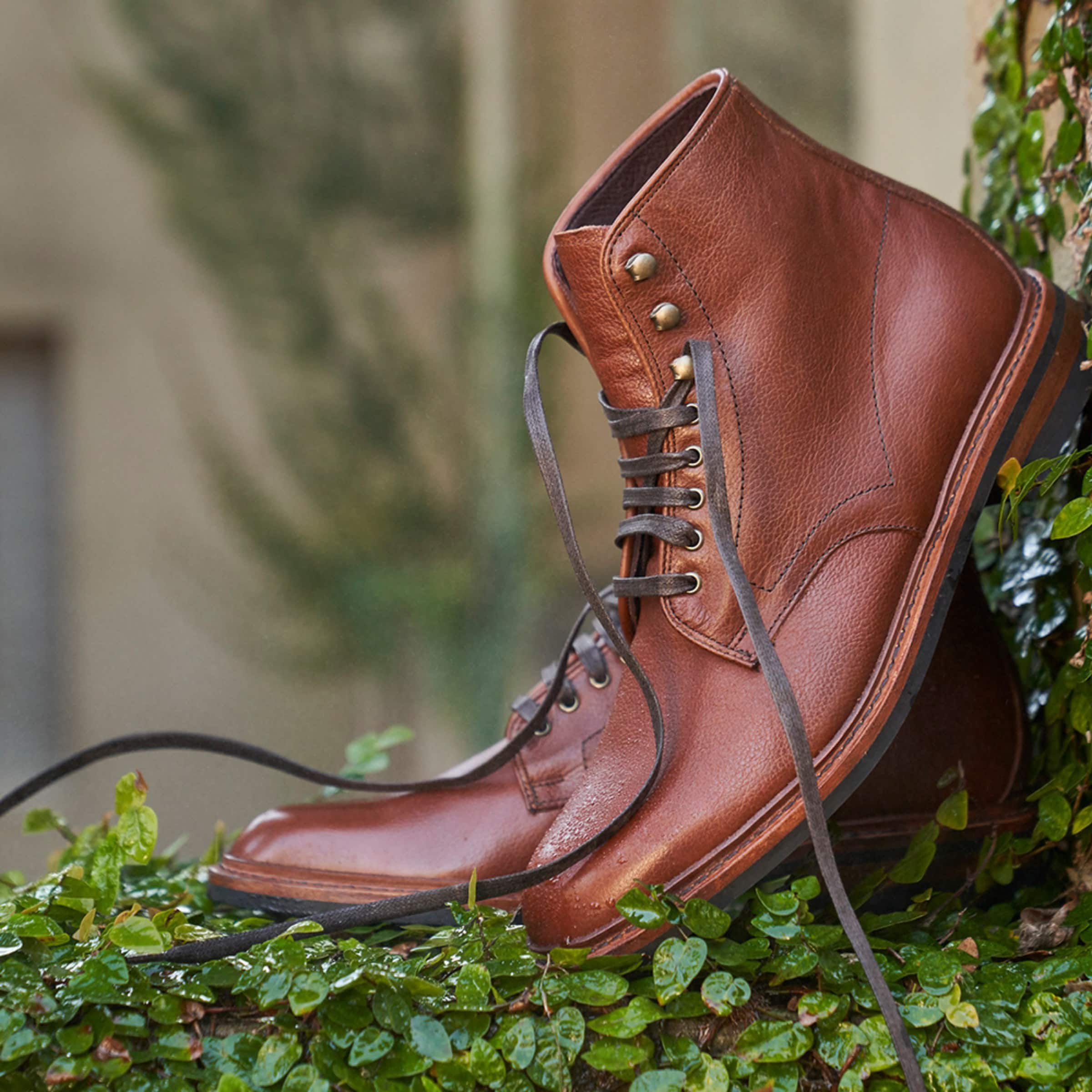Allen Edmonds Higgins Mill Weatherproof Boot with Dainite Rubber Sole on leaves