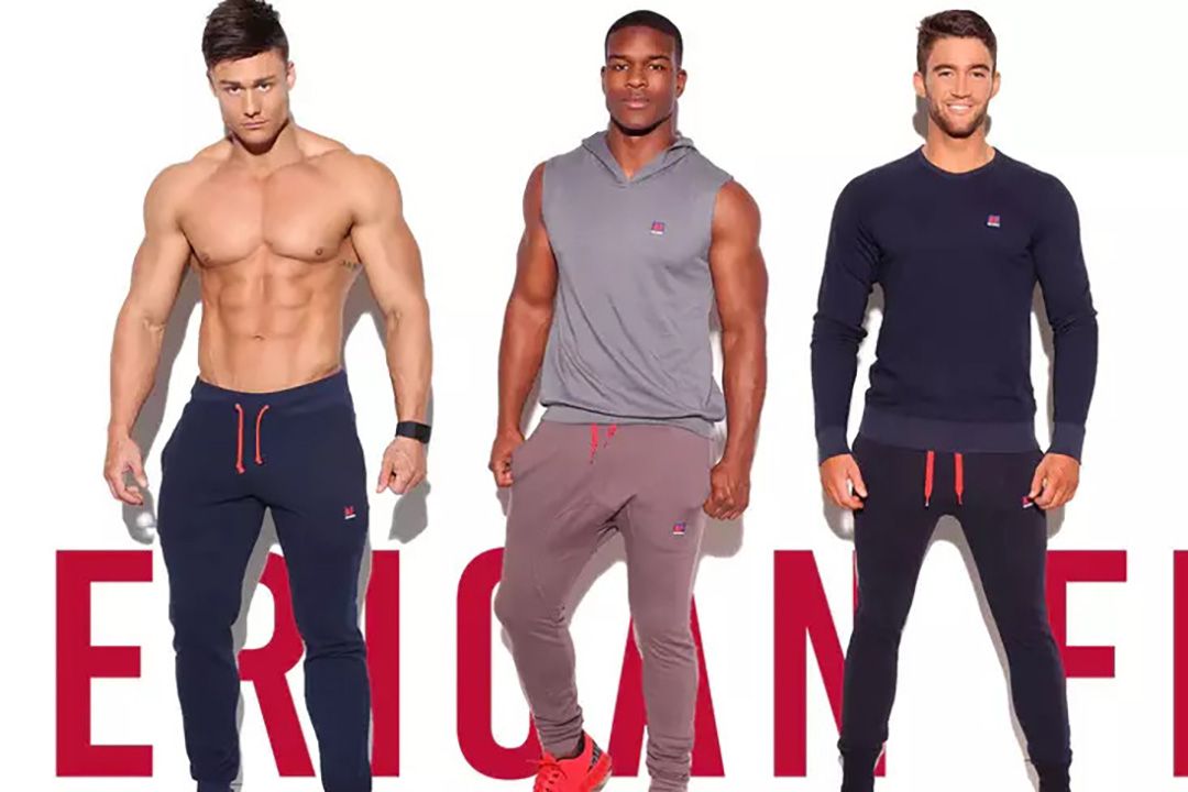 Three young buff men modeling American Fitness Wear