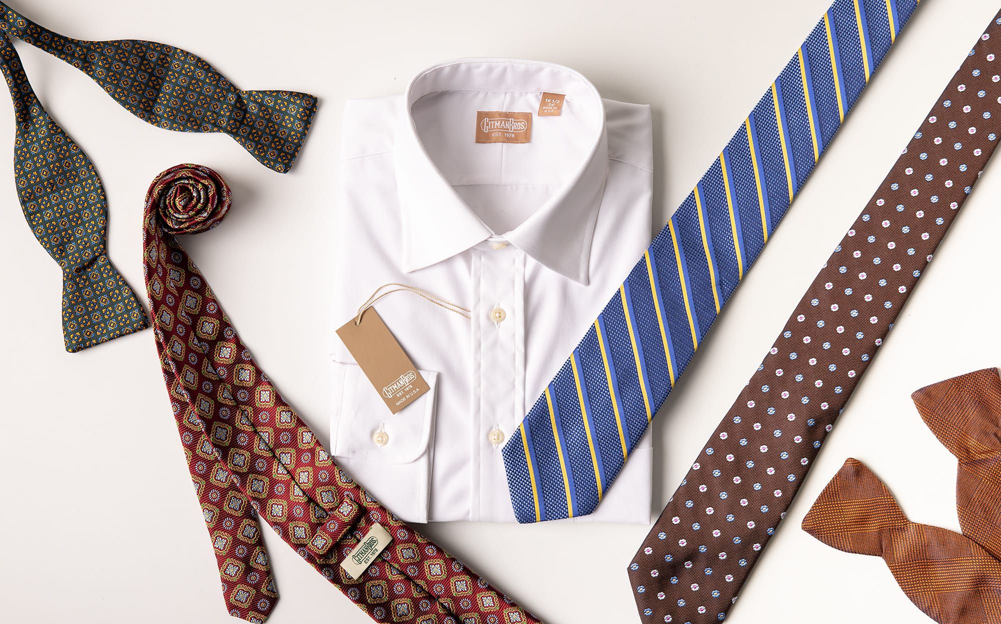 Gitman Bros. white shirt and ties on a white background