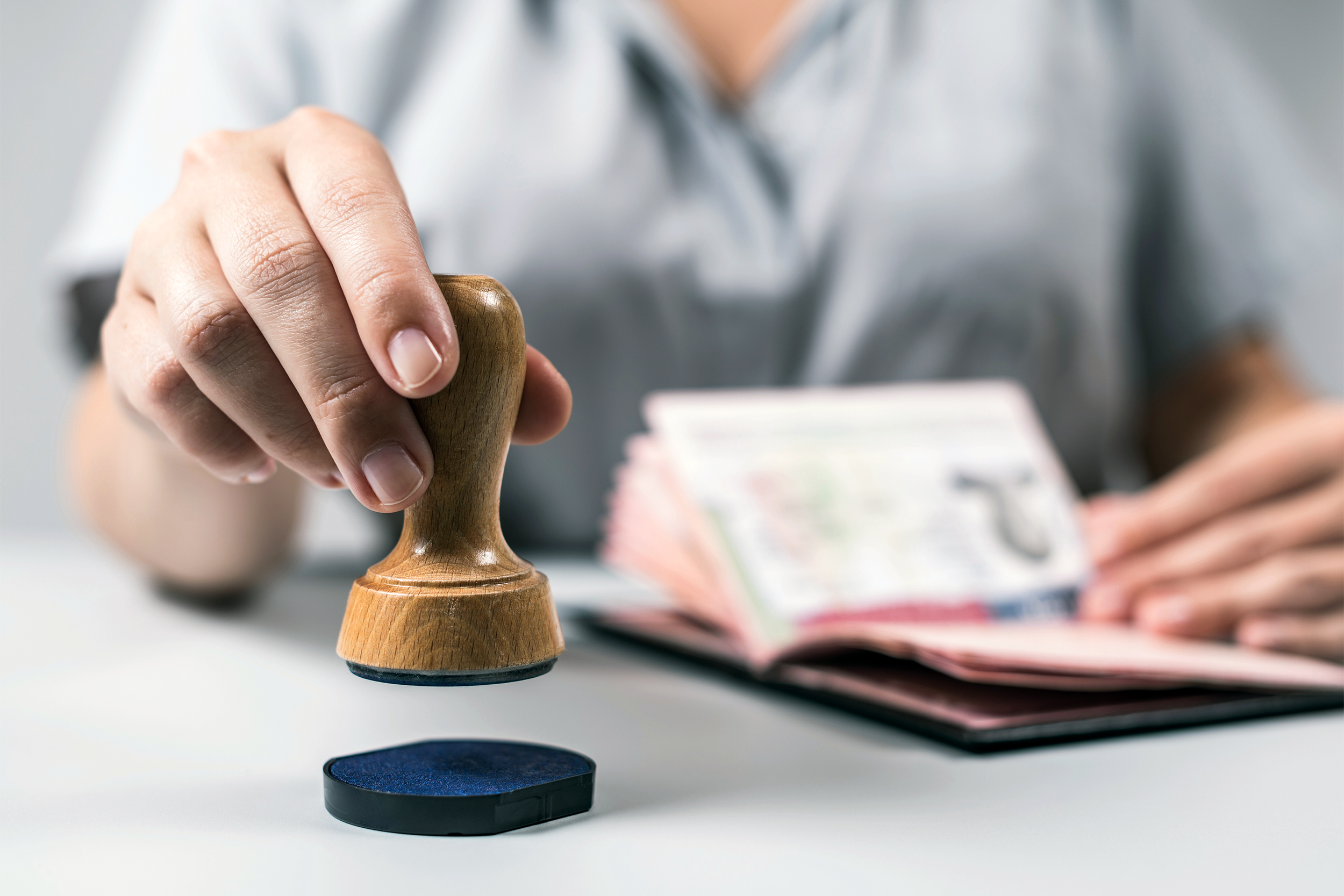 Woman stamping visa