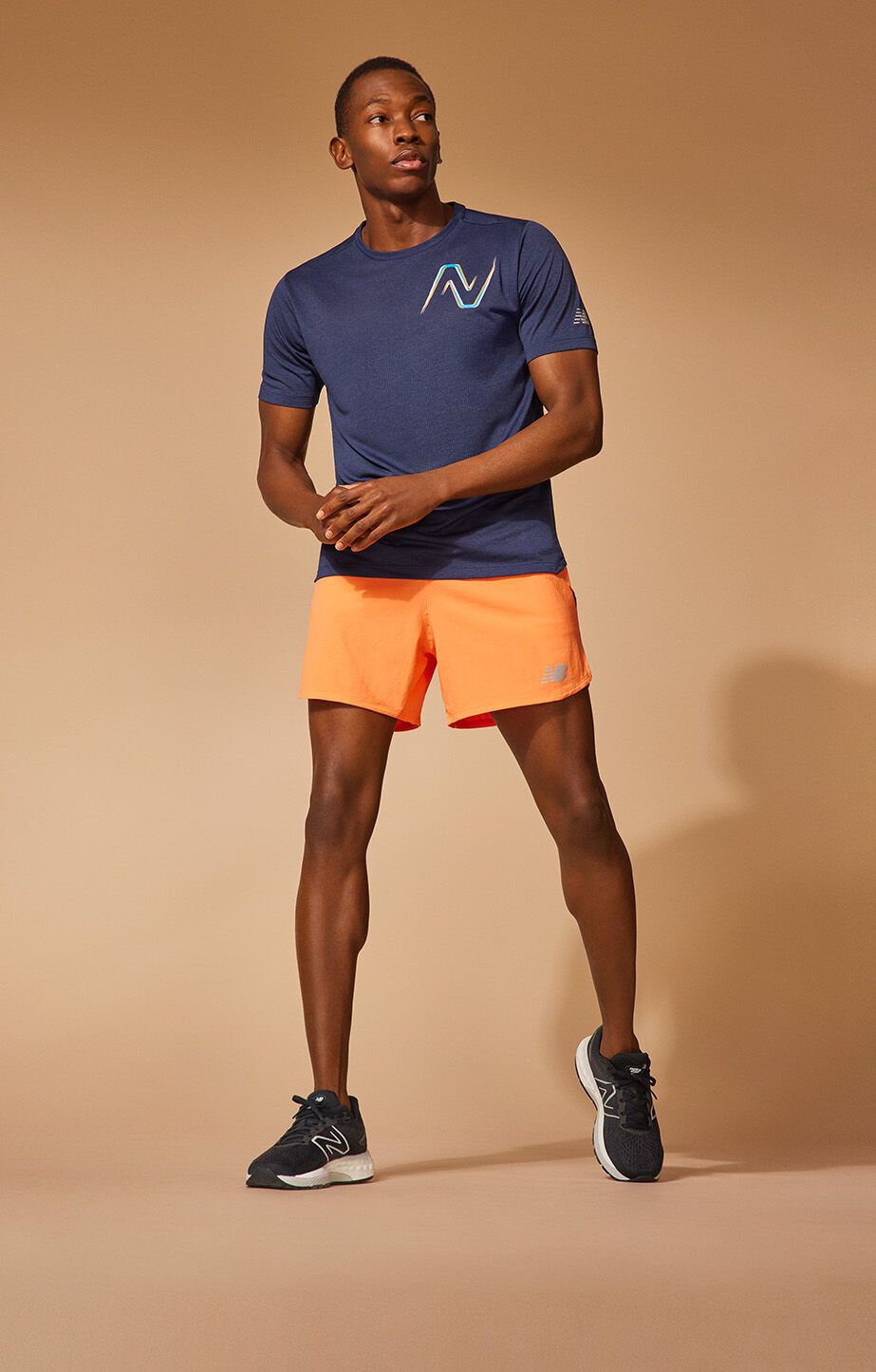 Young man wearing New Balance Shoes and sports clothes