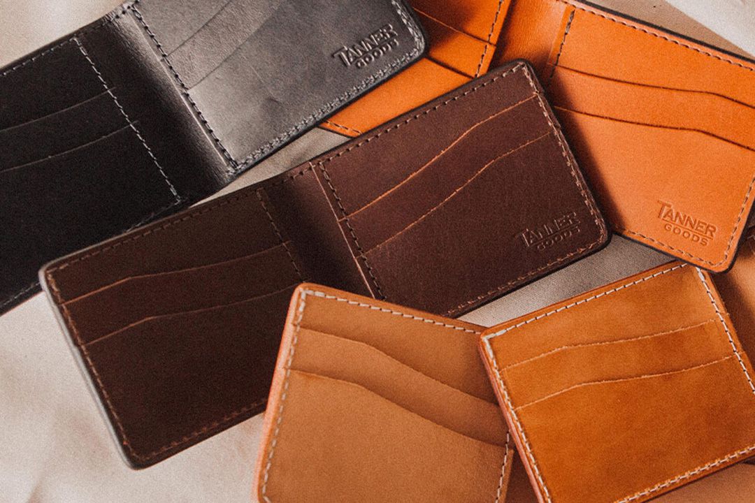 Neutral colored Tanner Goods wallets on display