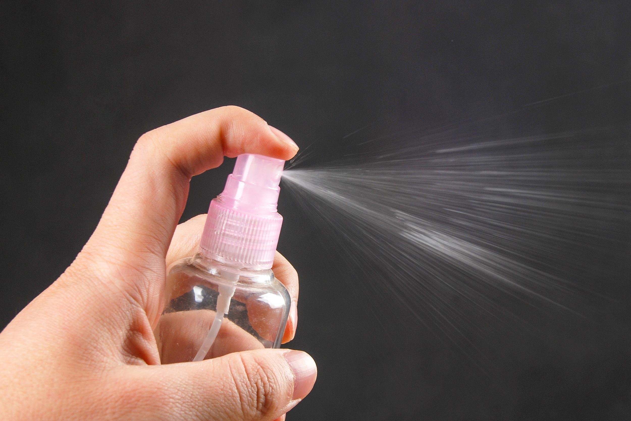 hand spraying with sprayer