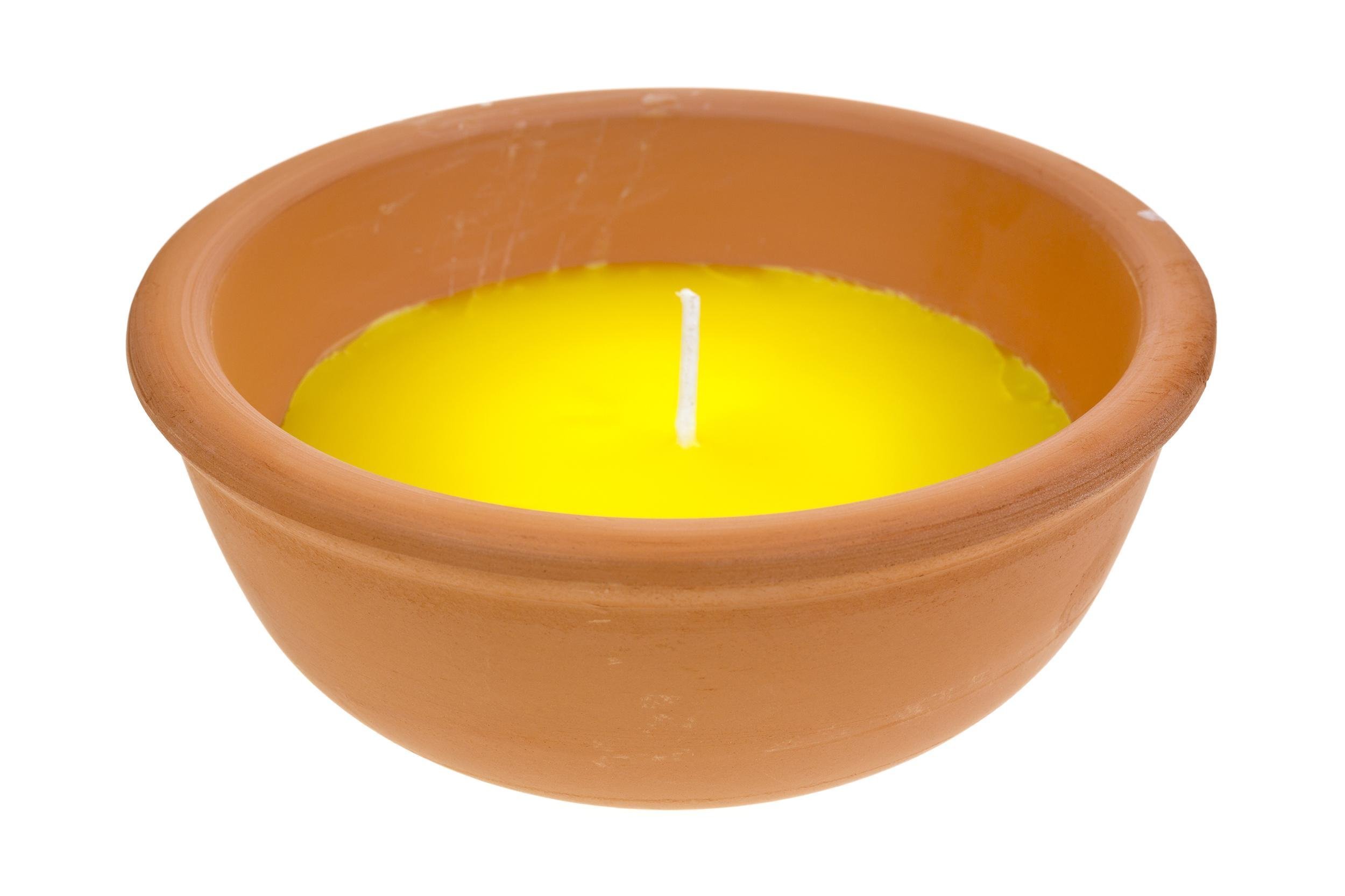 large citronella candle in a red clay bowl