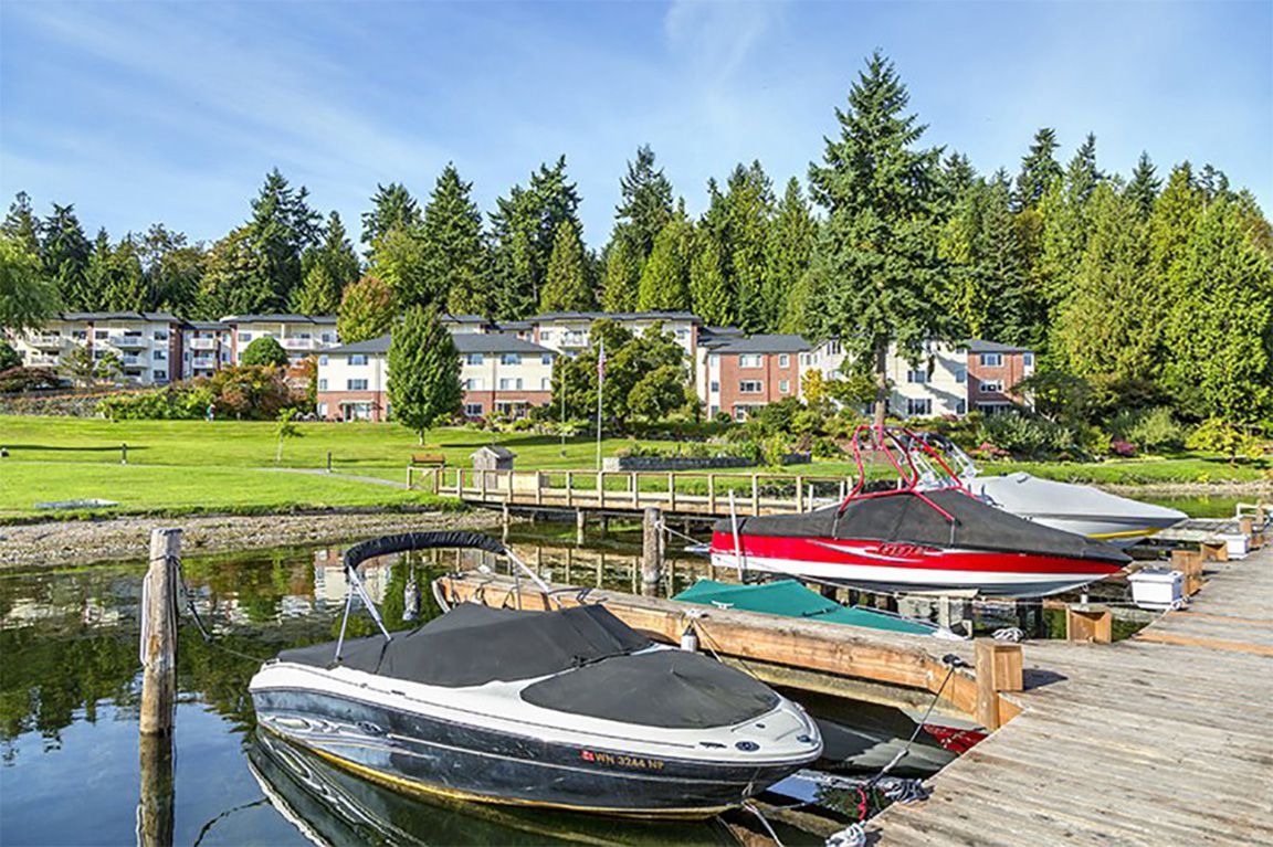 Small boats moored at a dock at Covenant Shores