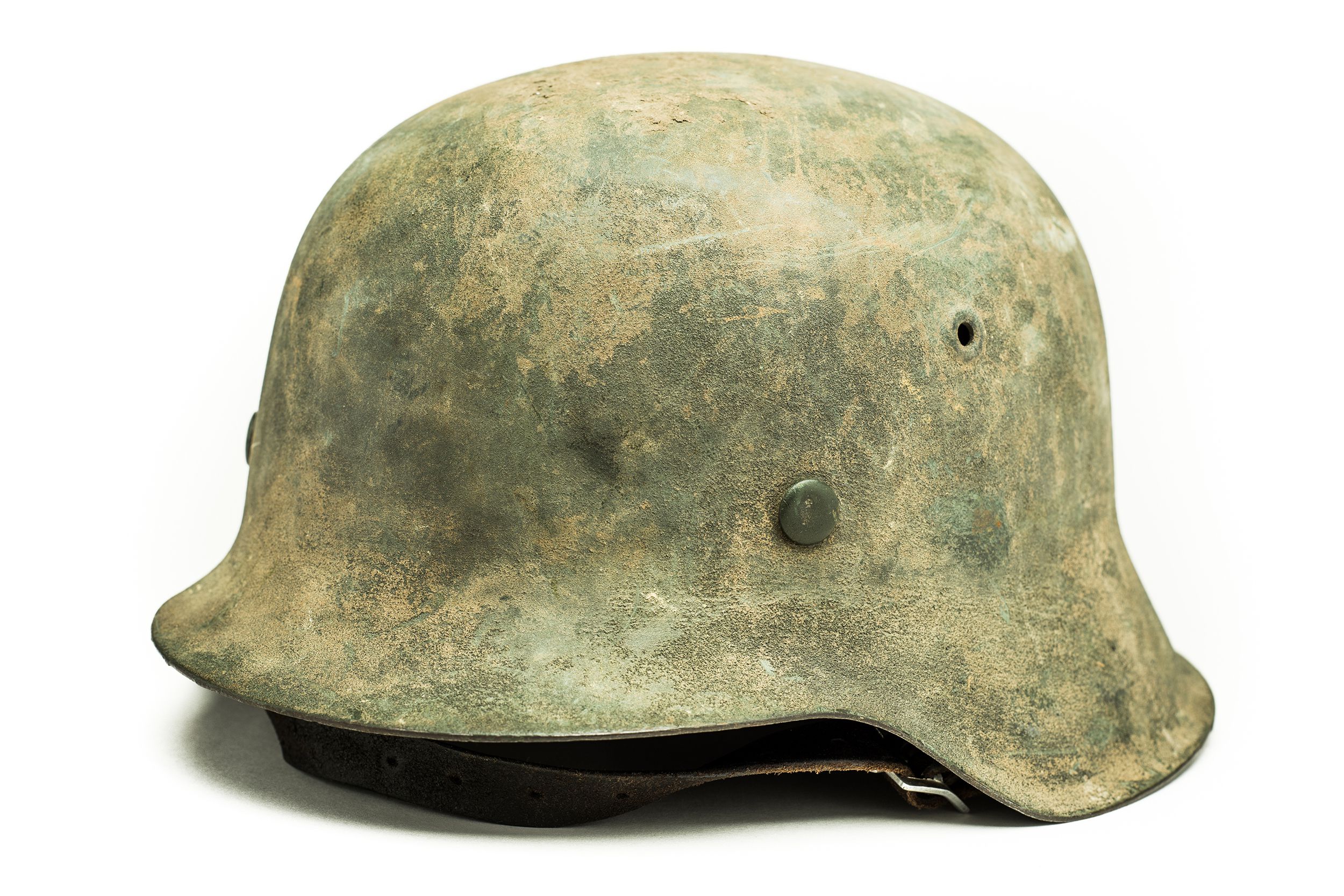 German late World War II military helmet with anti-glare coating on a white background