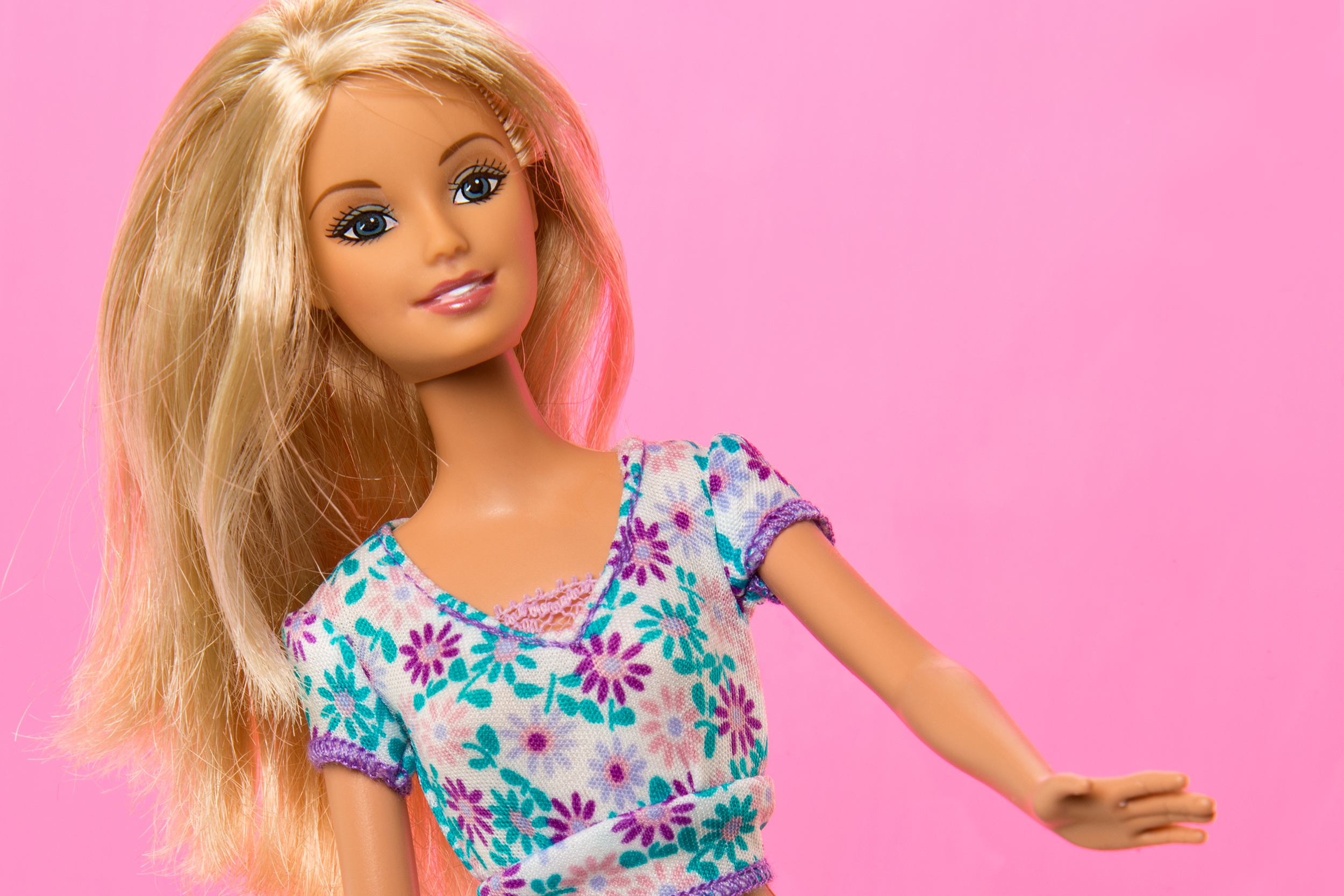 Barbie on a pink background