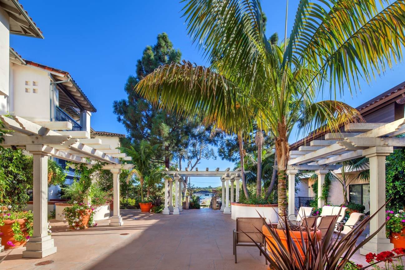 The Samarkand, Santa Barbara, California on a beautiful sunny day with palms