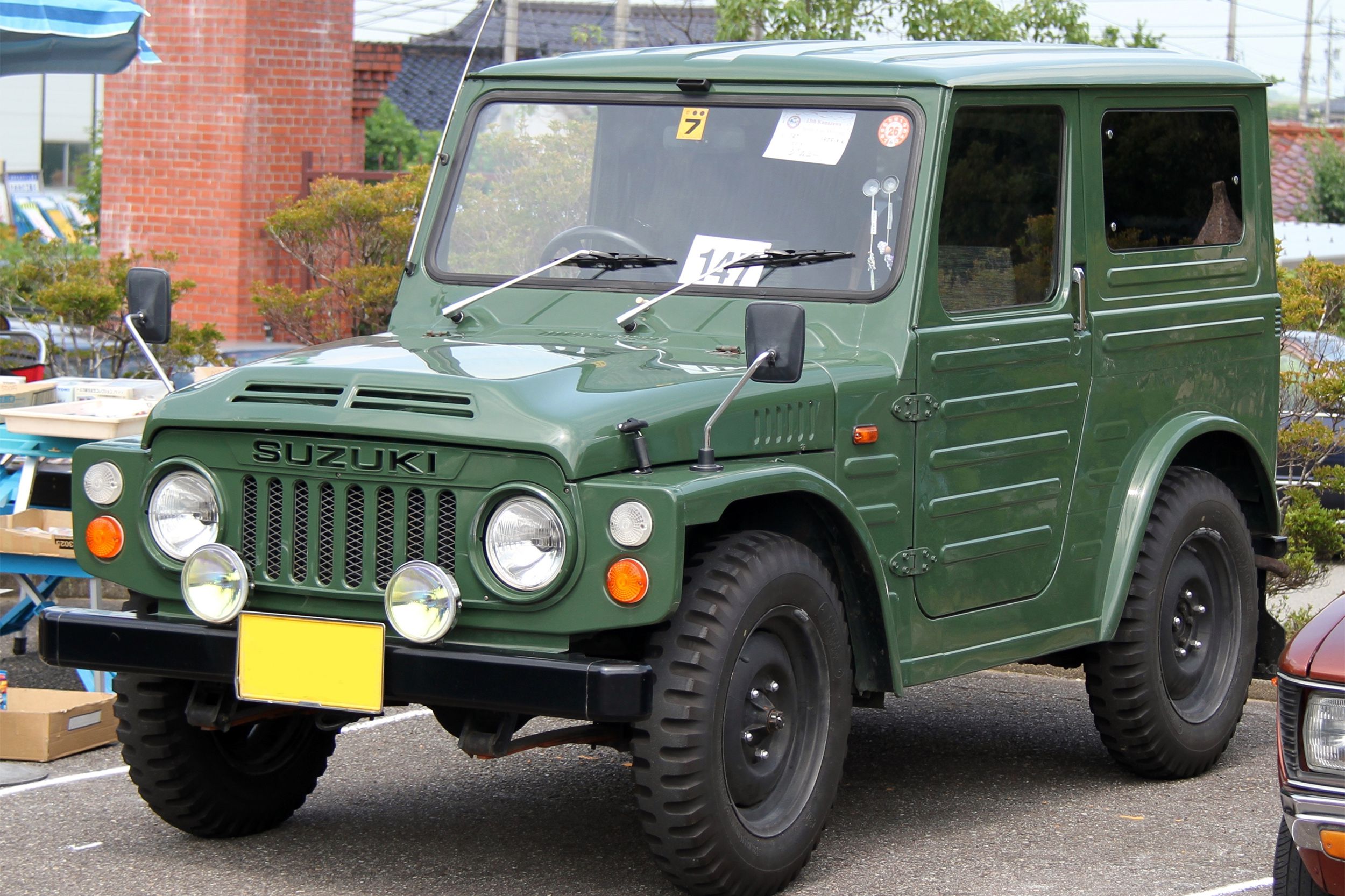 Dark green Suzuki Jimny SJ20.