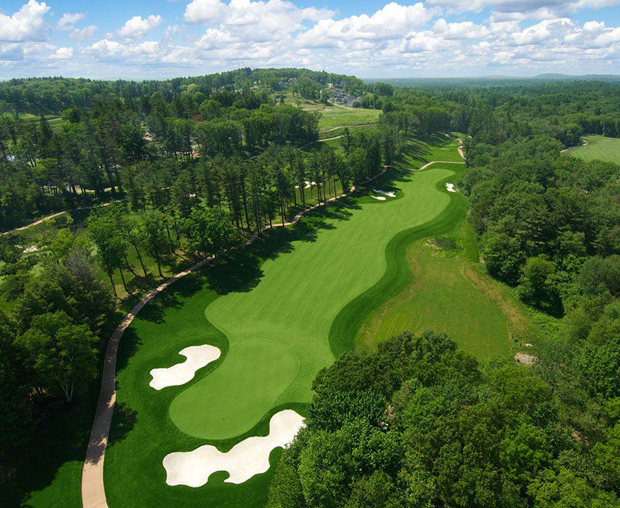Aerial view of bright breen Turner Hill golf course