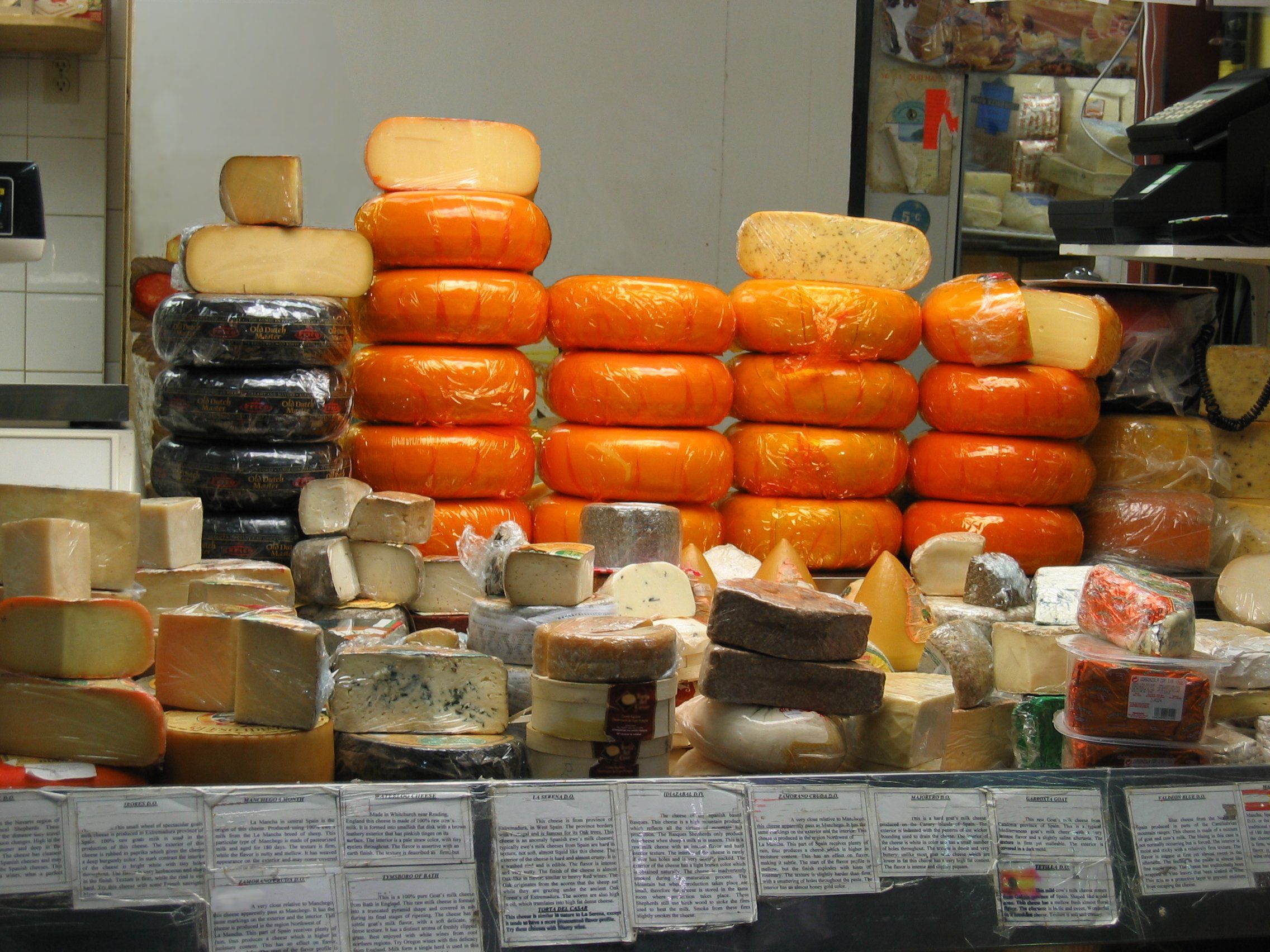 Wheels of Deli Cheeses. I would enjoy hearing how you use this image. Thanks.