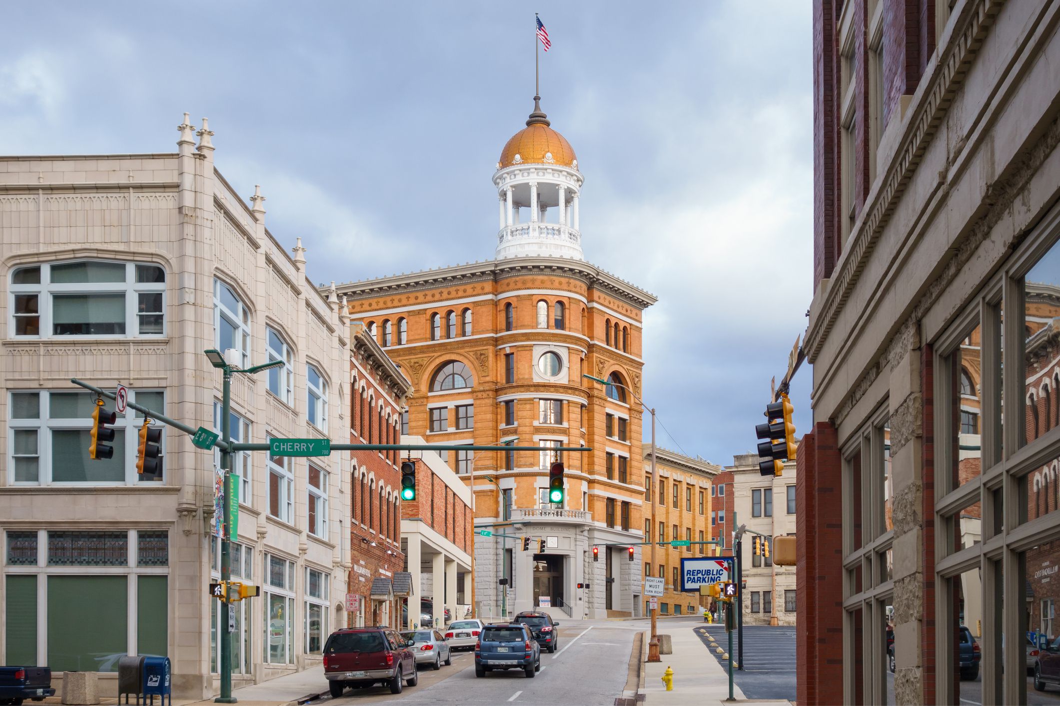 Photo of East 8th street with the ornate, orange brick Dome Building, built in 1892, in downtown Chattanooga, Tennessee, USA