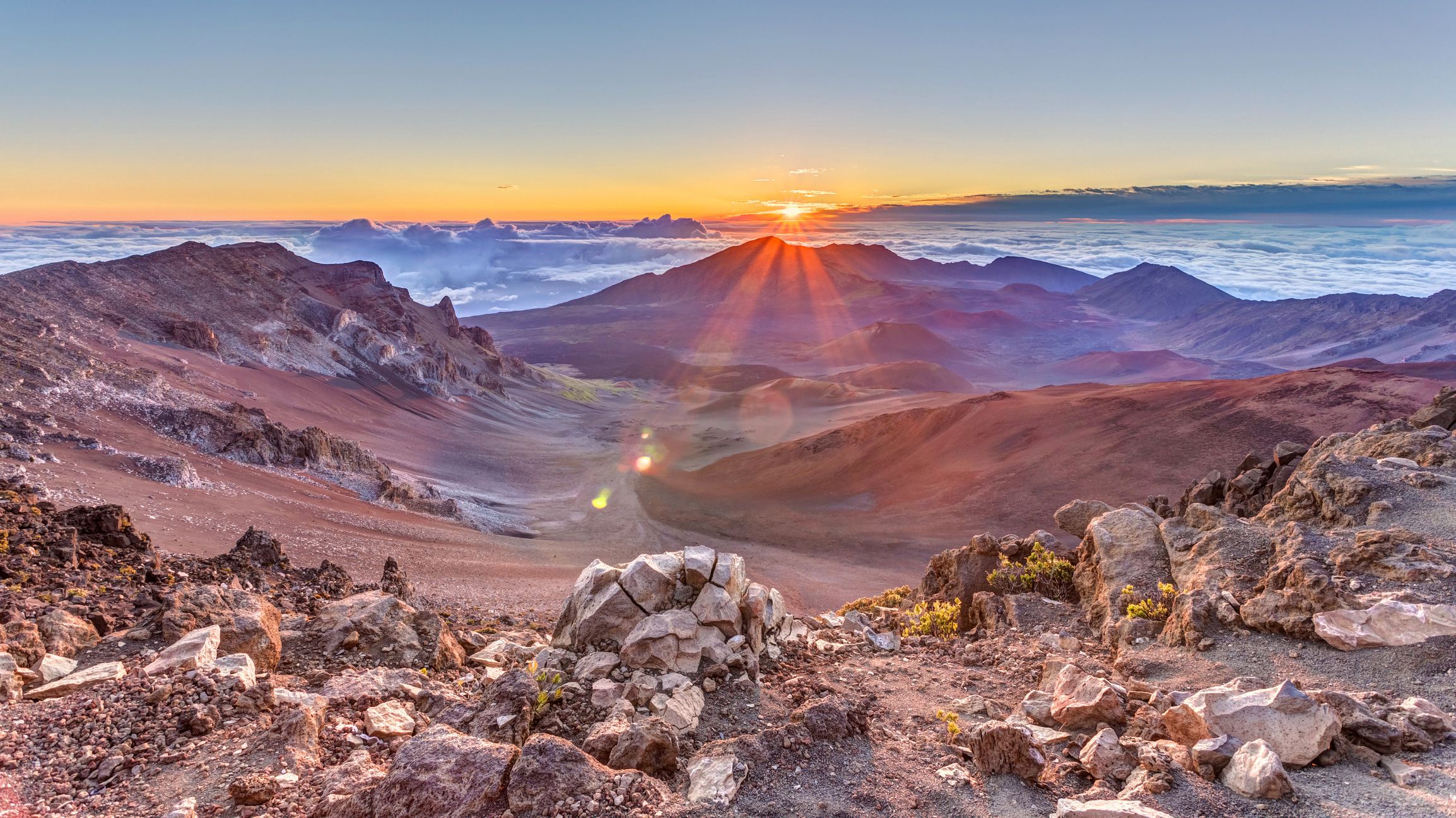 sunrise from the summit of Haleakala volcano on the tropical island of Maui, Hawaii