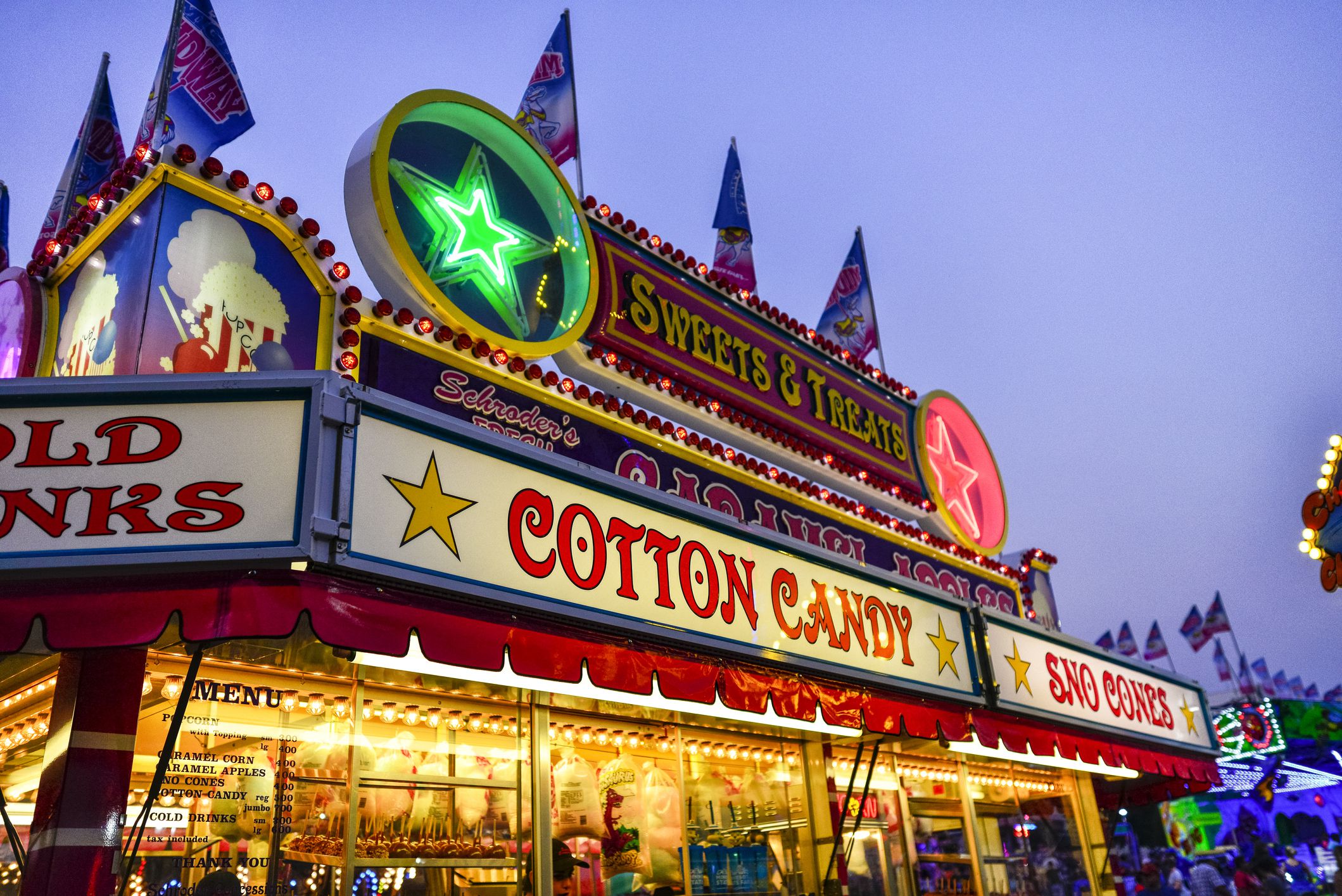 Falcon Heights, Minnesota, USA - September 3, 2017: Sweats and Treats with Cotton Candy and Sno Cones Stand at the Minnesota State Fair in Falcon Heights, Minnesota. The MN State Fair is a 12 day annual event.