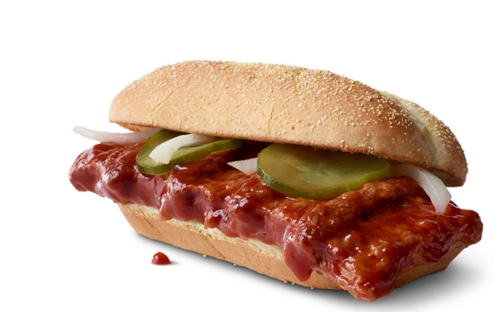 A barbecue pork rib sandwich topped with sliced pickles and onions, served in a hoagie-style bun on a white background.