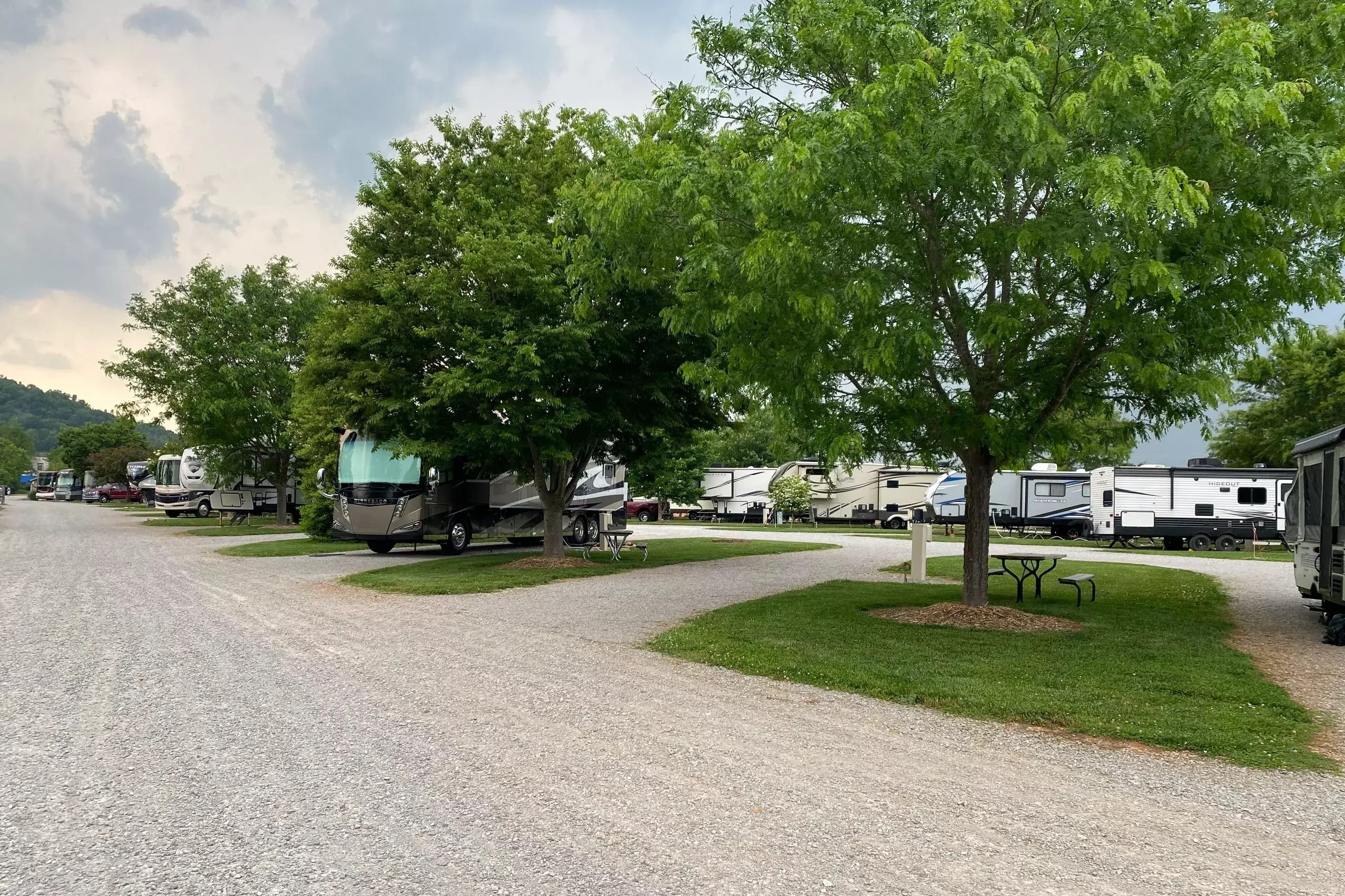 Cave Country RV Campground, Cave City, Kentucky, RV park area with the sun setting