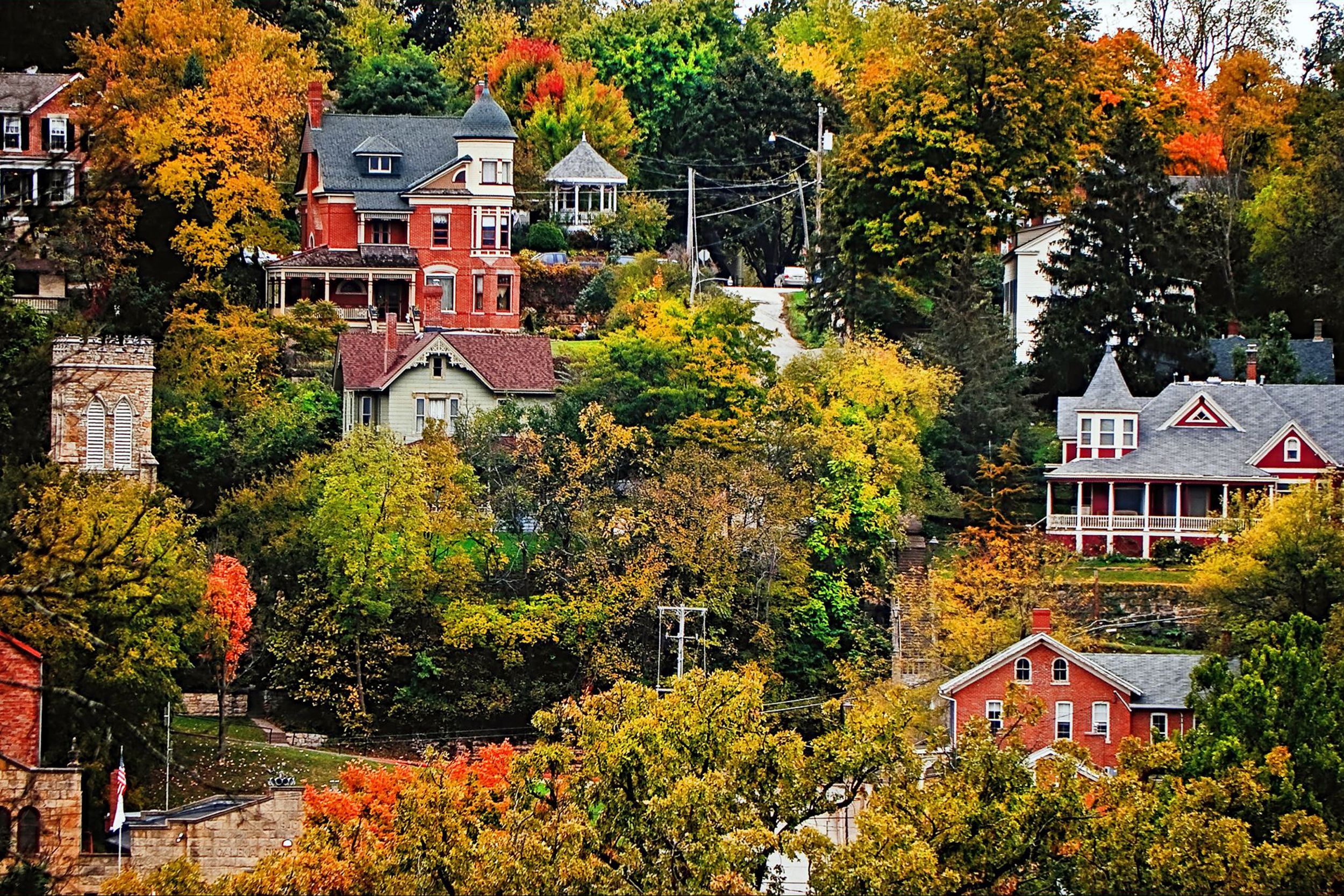 Homes along Hill Street, Galena, Illinois during autumn, going up a hill