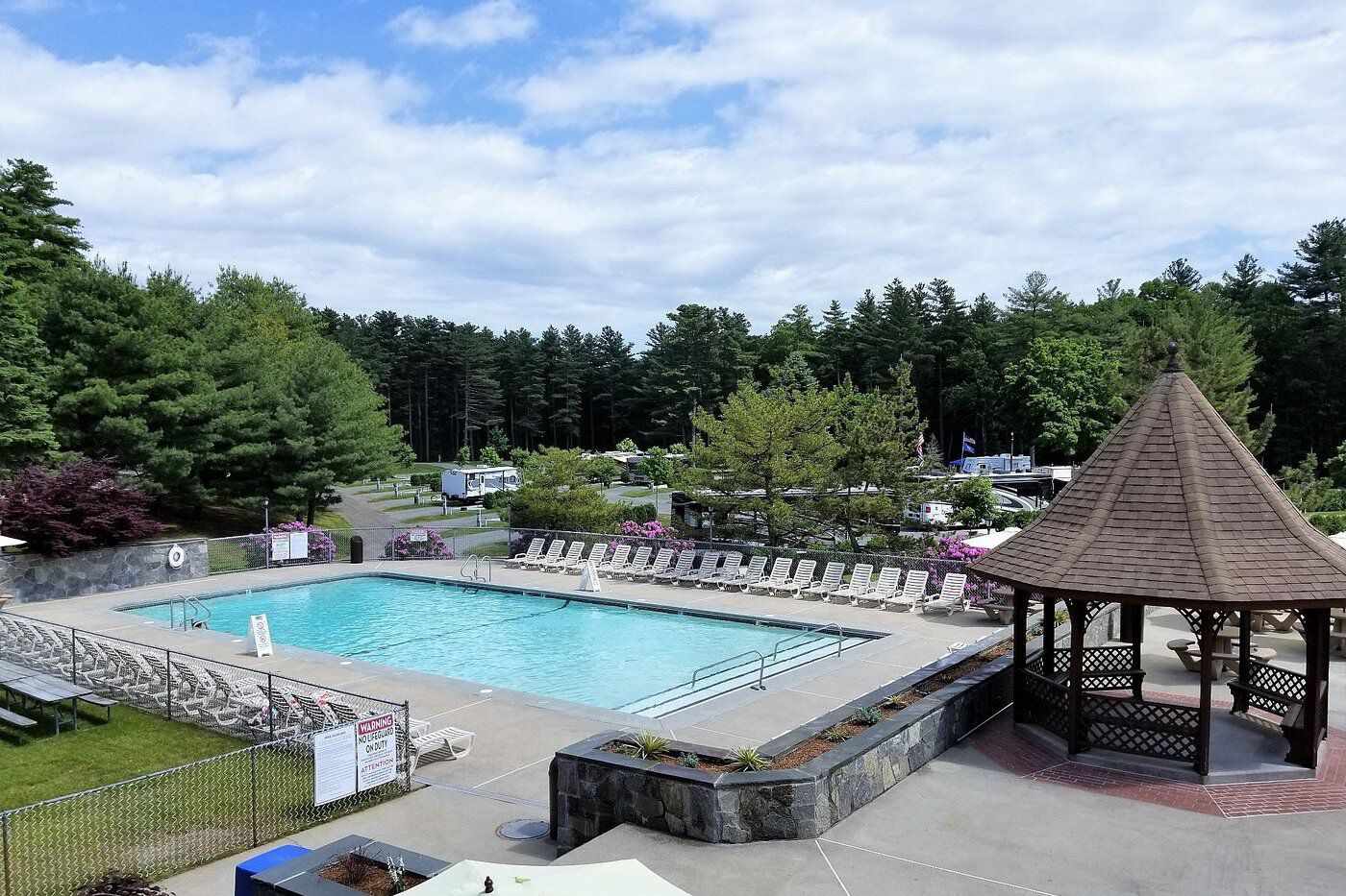 Normandy Farms, Foxboro, Massachusetts, pool in the foreground with RV park area in the background