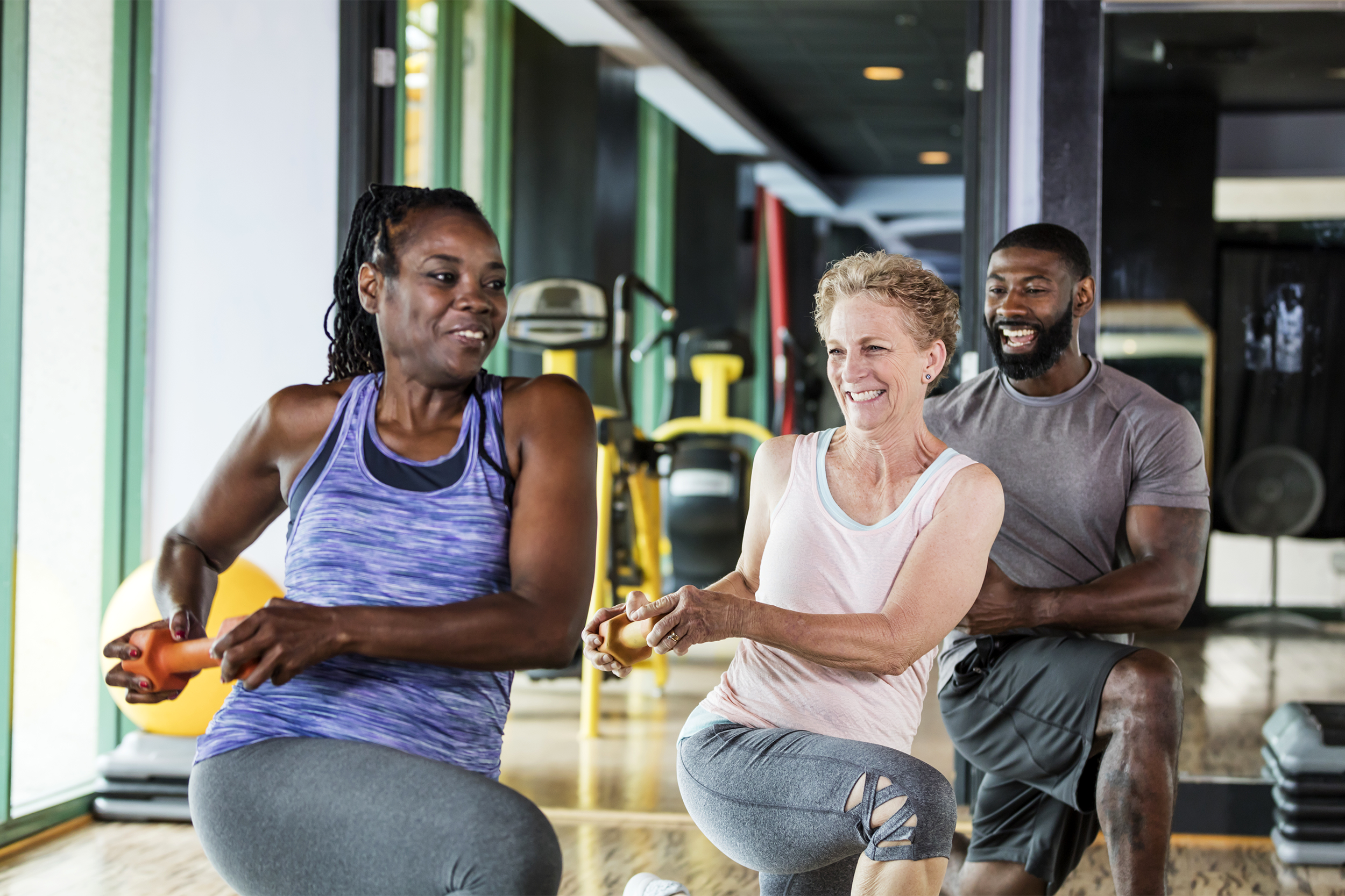 Group of people exercising at gym