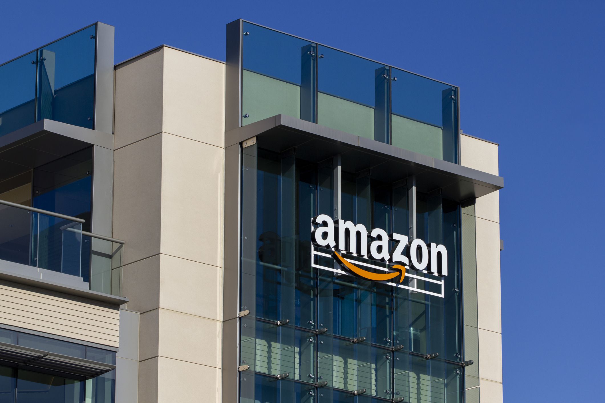 Palo Alto, CA, USA - Feb 18, 2020: The Amazon logo seen at Amazon campus in Palo Alto, California. The Palo Alto location hosts A9 Search, Amazon Web Services, and Amazon Game Studios teams.