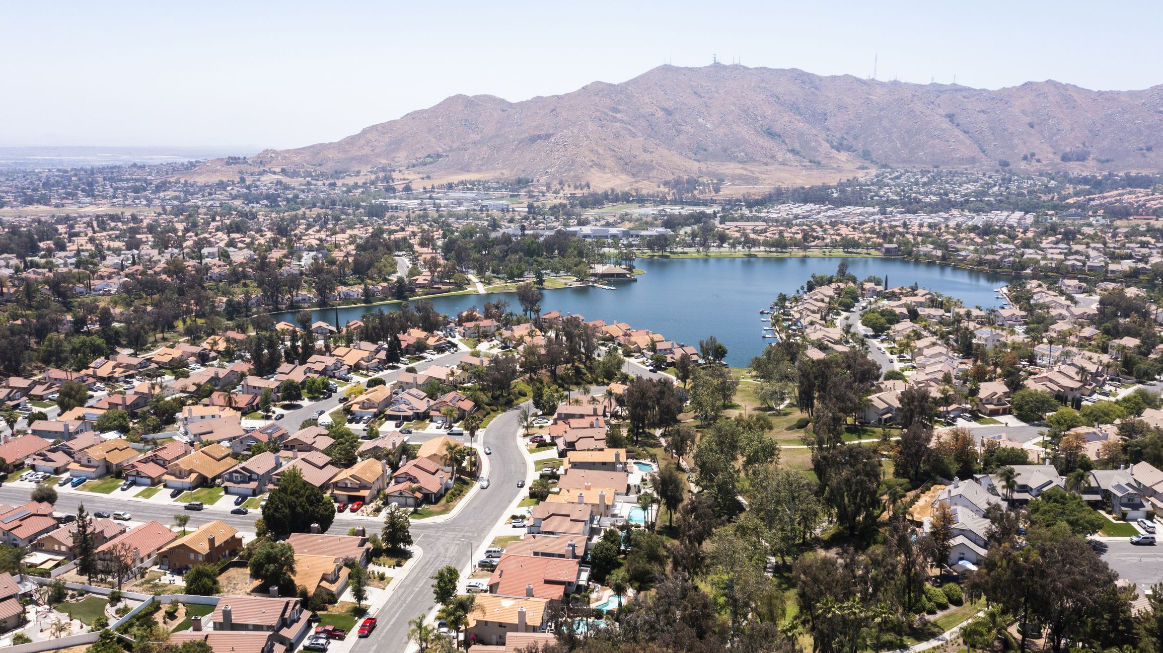 Daytime aerial view of a suburban neighborhood in Moreno Valley, California, USA.