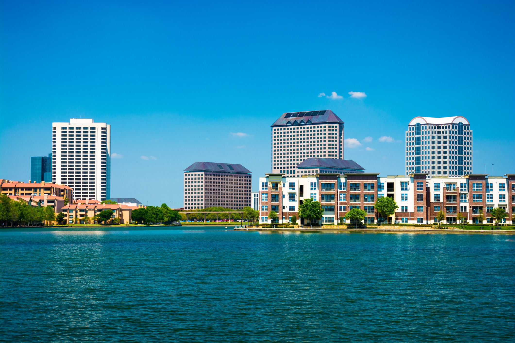Skyline of the Las Colinas area of Irving, Texas with Lake Carolyn in the foreground. Irving is a part of the Dallas - Fort Worth Metroplex.