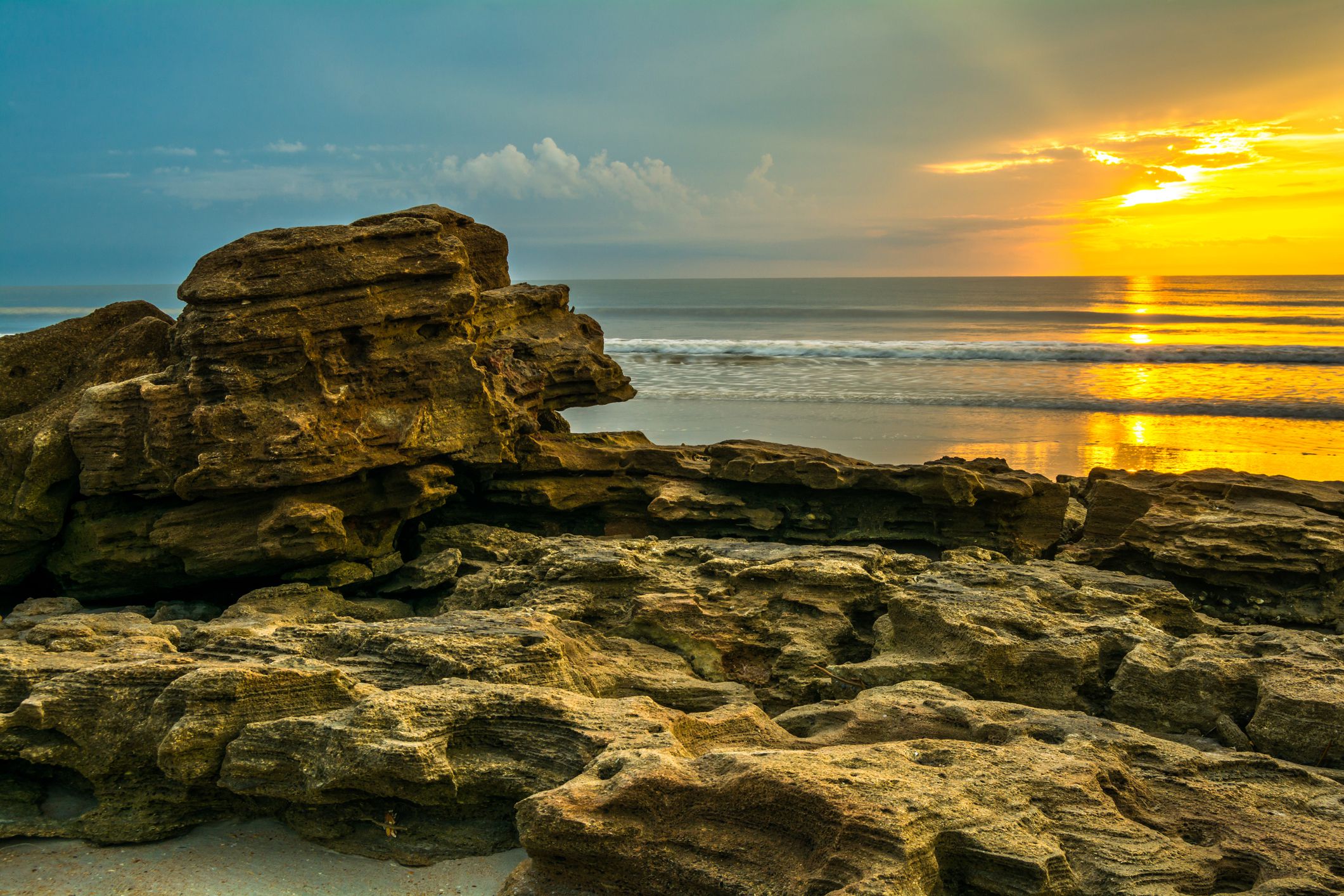 Sunrise along the beach of Washington Oaks Gardens State Park in Florida.