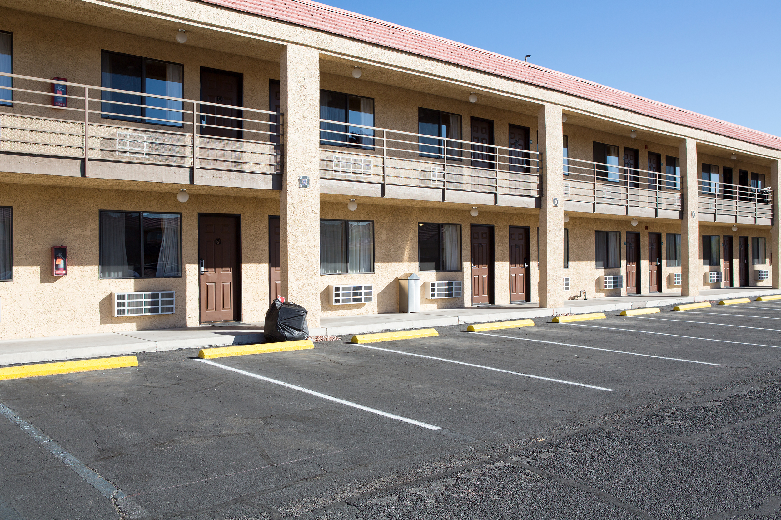 parking lot view of a motel