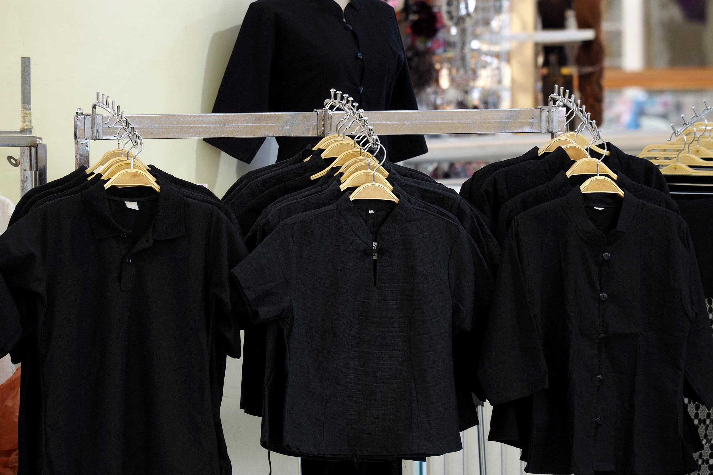 black clothes in clothing store
