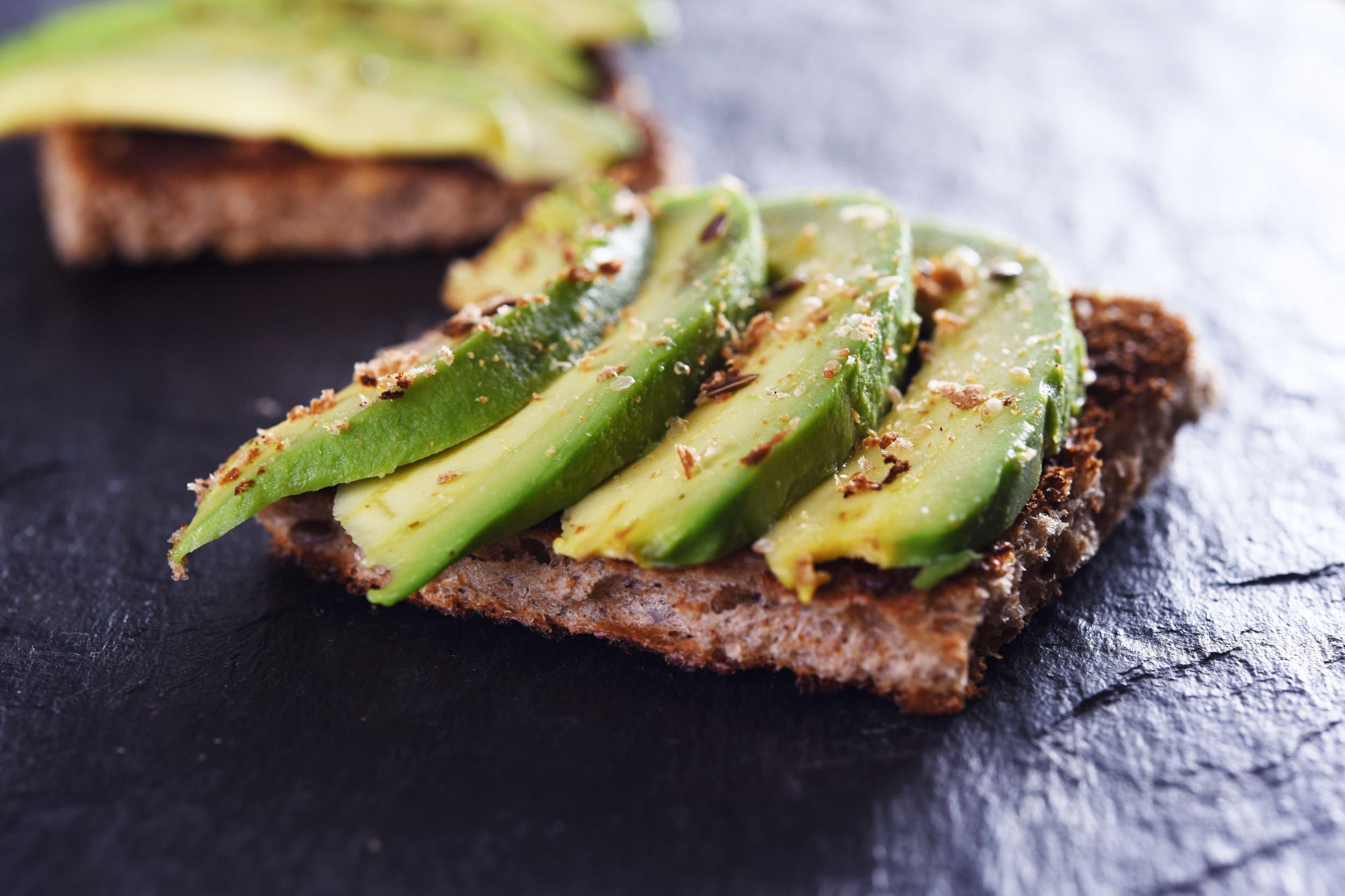 Avocado Toast on black stone-like background