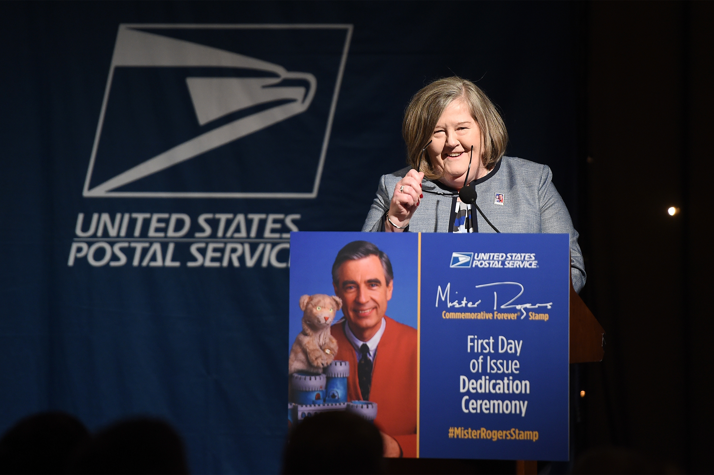 Post Master Megan J. Brennan attends the U.S. Postal Service Dedication of the Mister Rogers Forever Stamp