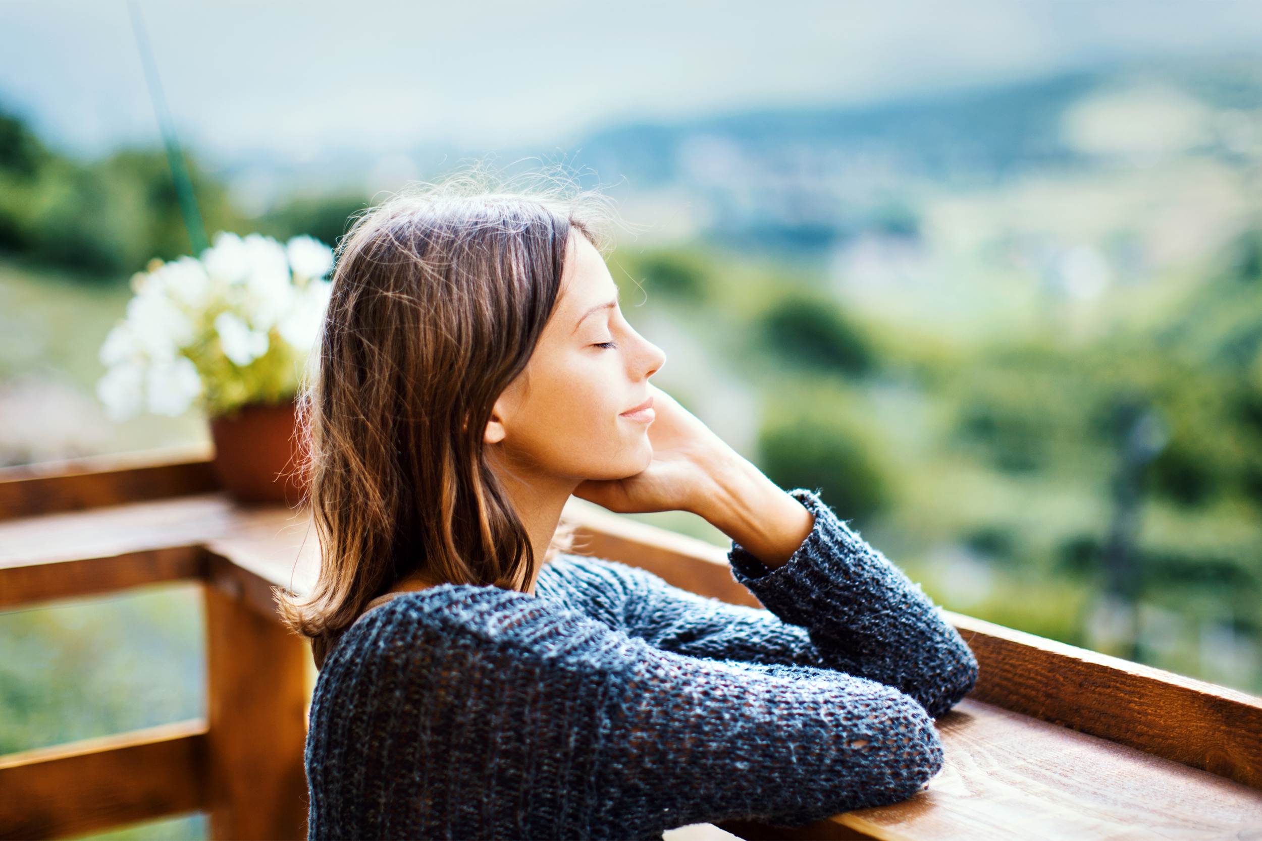 Woman breathing outside
