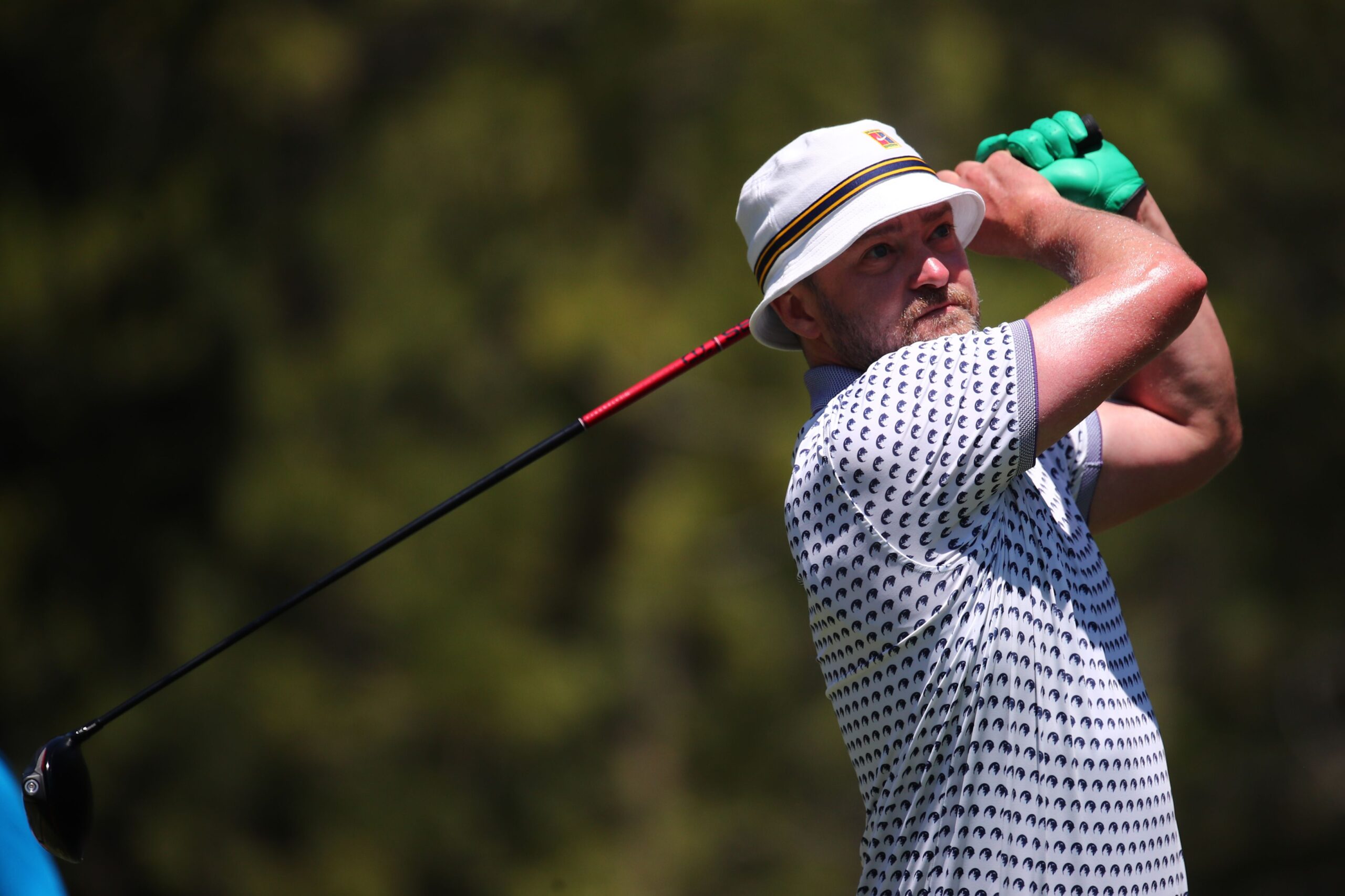 Musician and actor Justin Timberlake plays his shot from the 18th tee during the final round of the American Century Championship at Edgewood Tahoe Golf Course on July 10, 2022 in Stateline, Nevada.